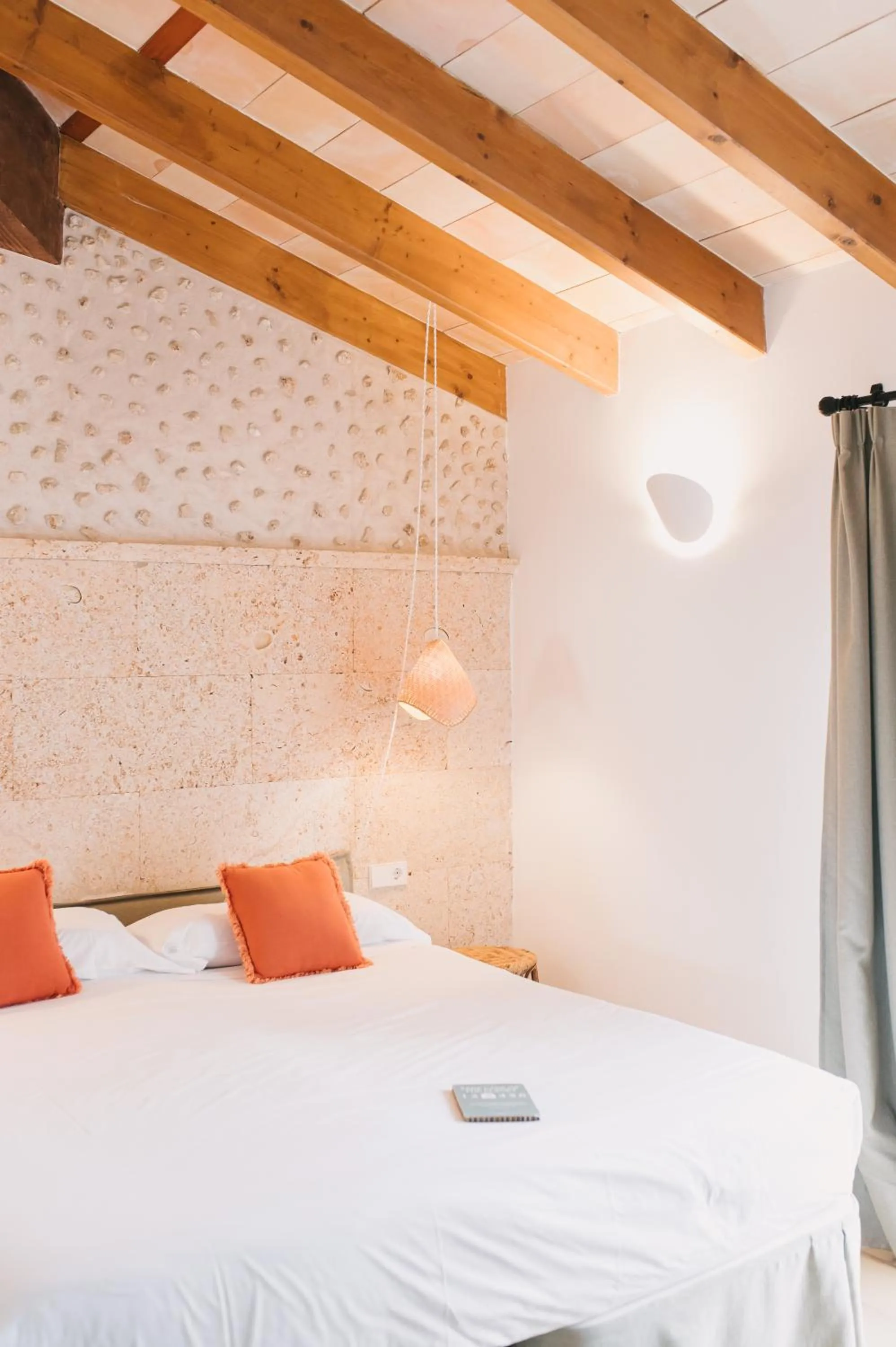 Bed in Curolla Petit Hotel