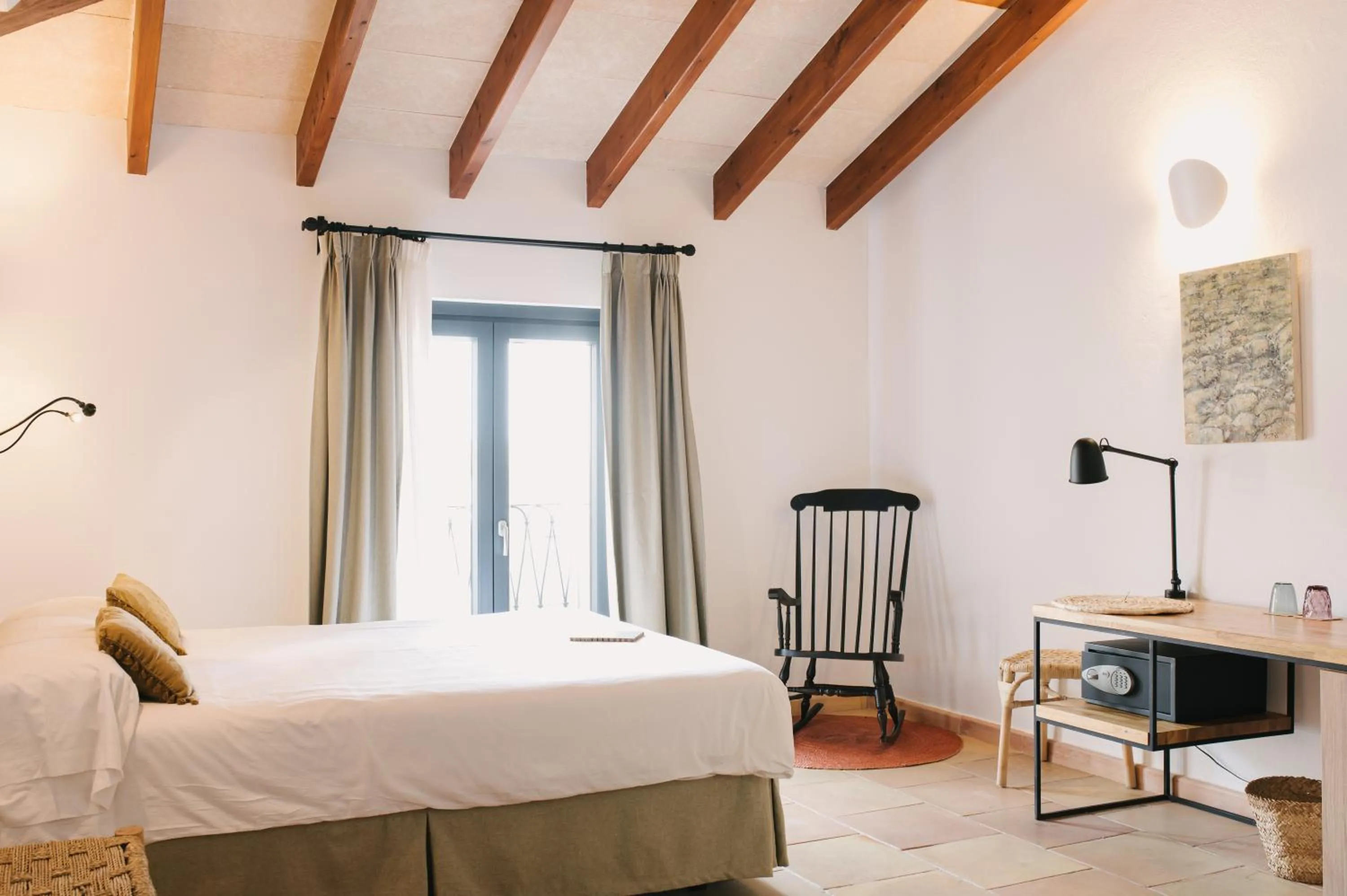 Bed in Curolla Petit Hotel