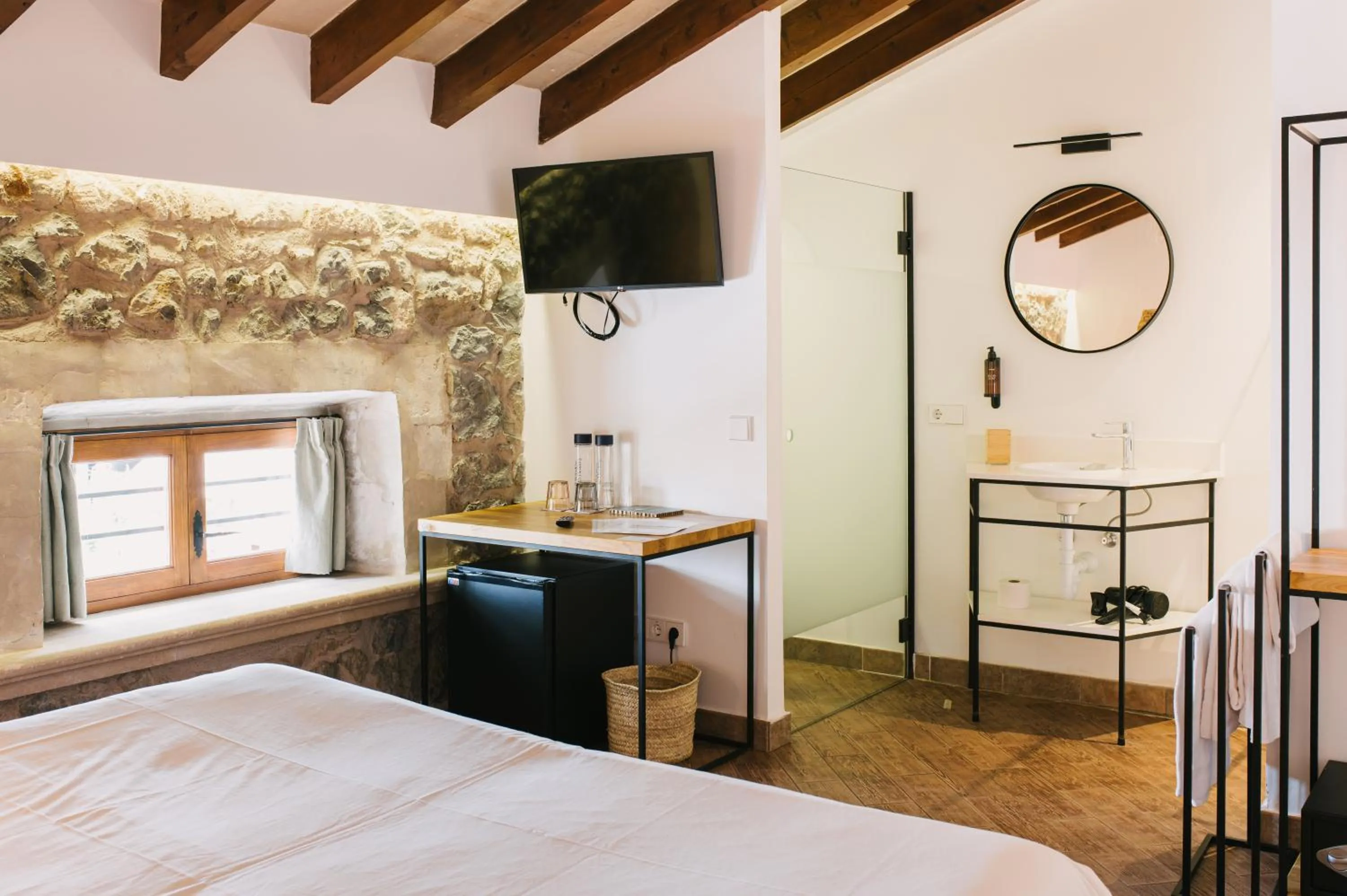 Bed in Curolla Petit Hotel