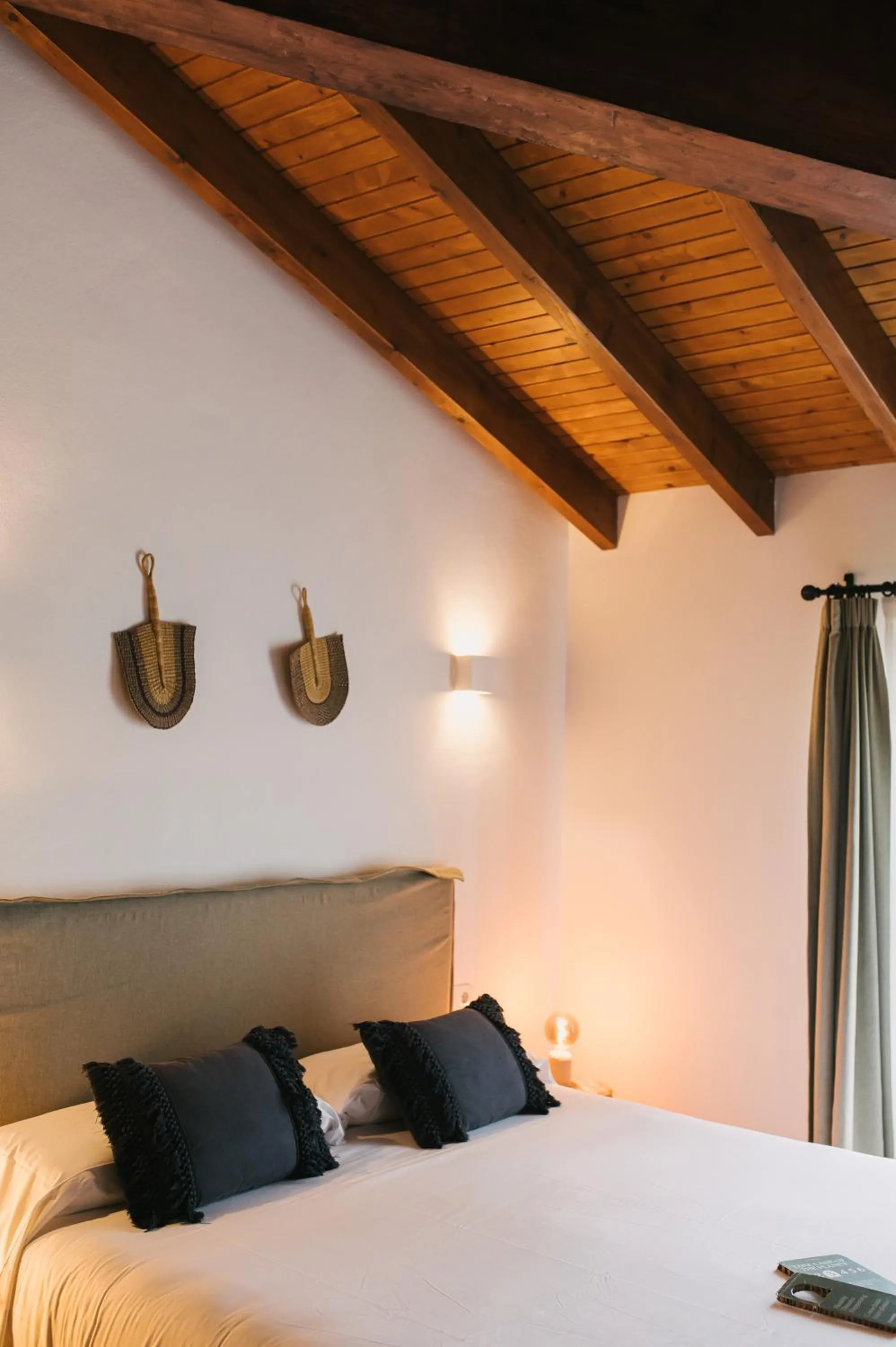 Bed in Curolla Petit Hotel