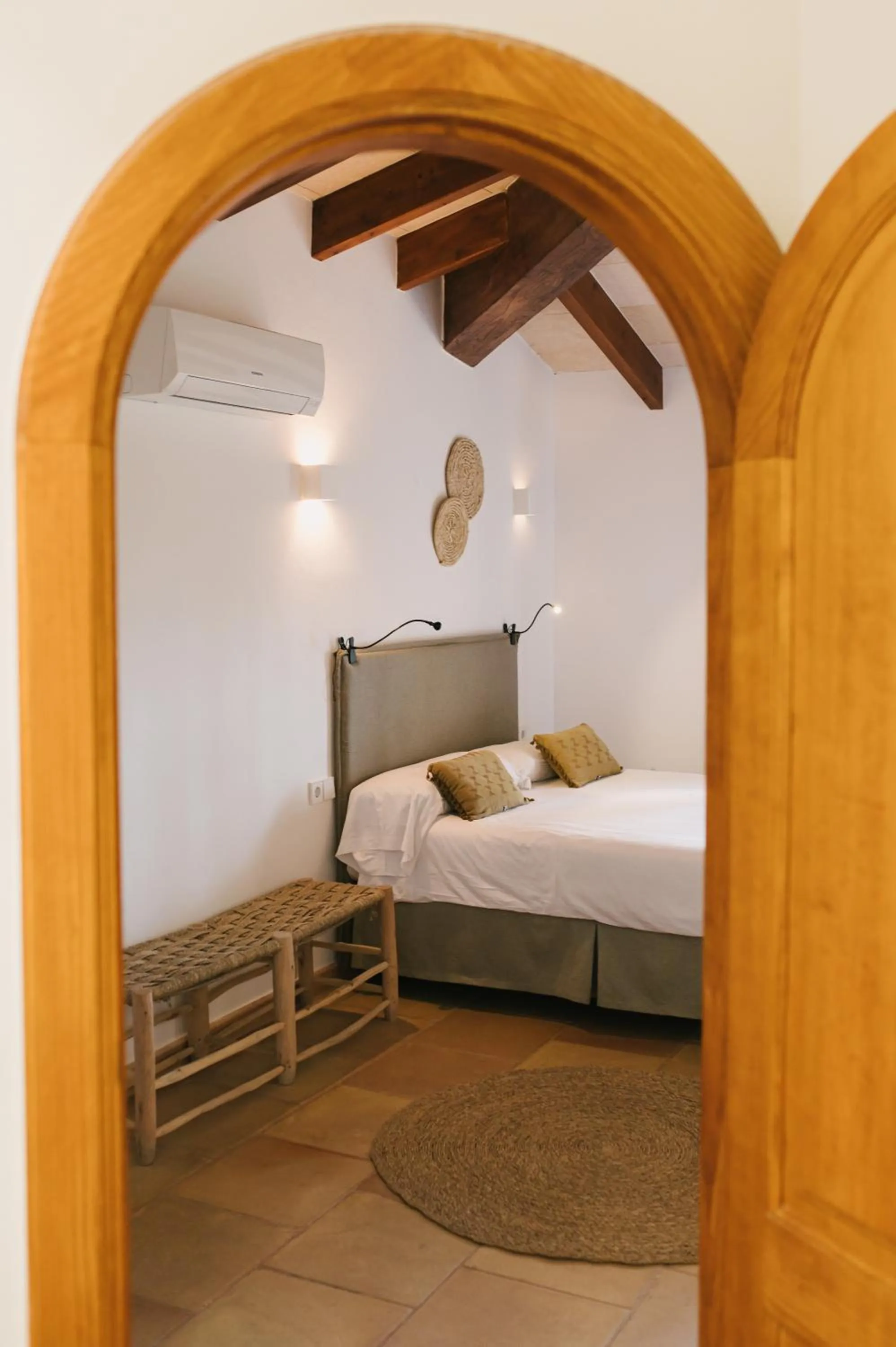 Bed in Curolla Petit Hotel