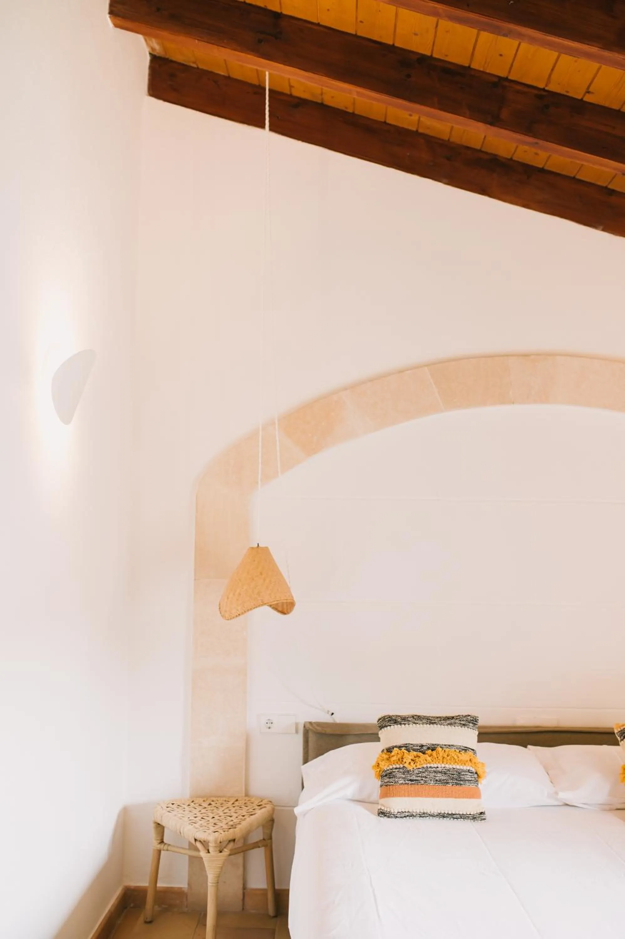 Bed in Curolla Petit Hotel