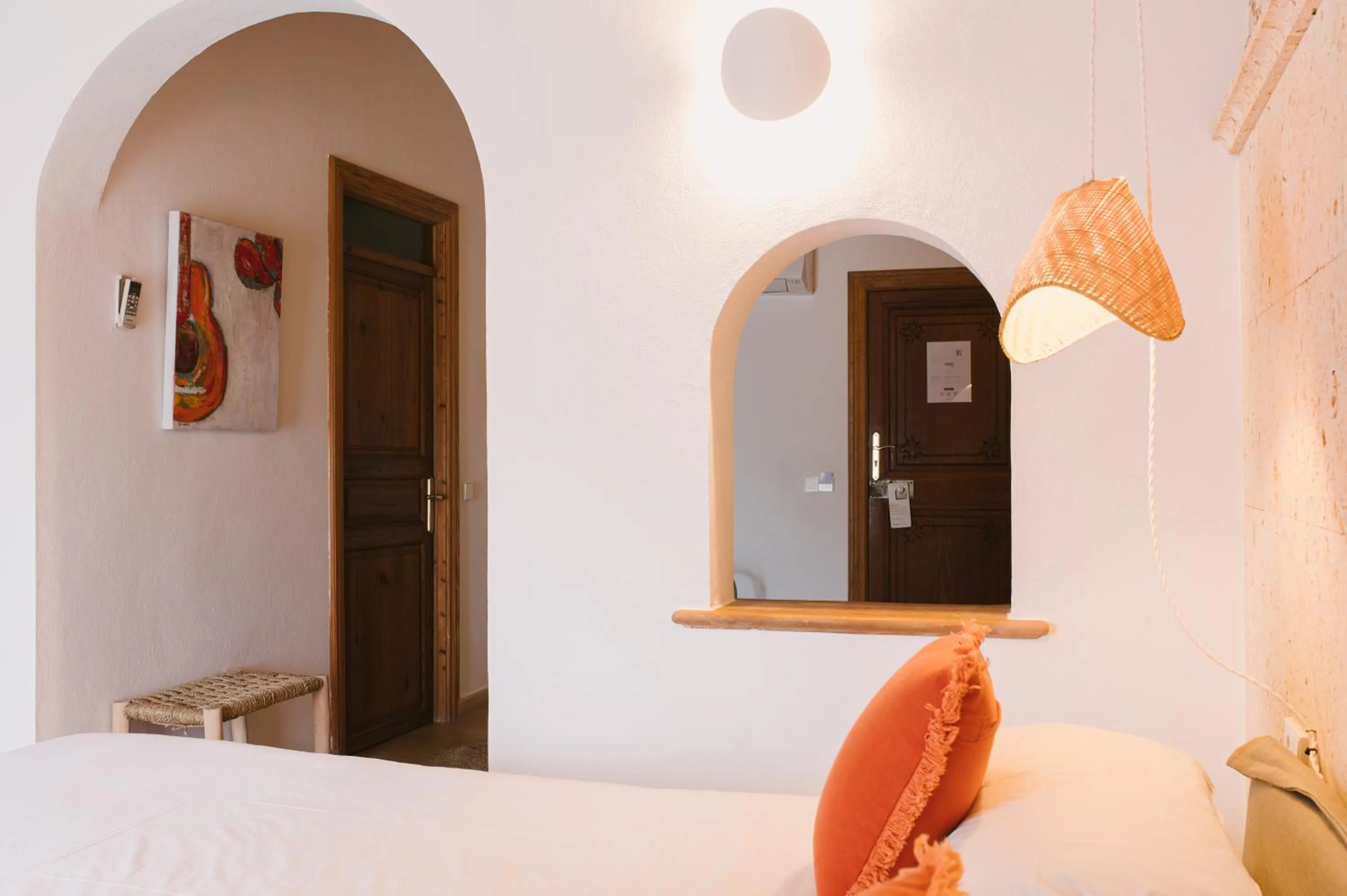 Bed in Curolla Petit Hotel