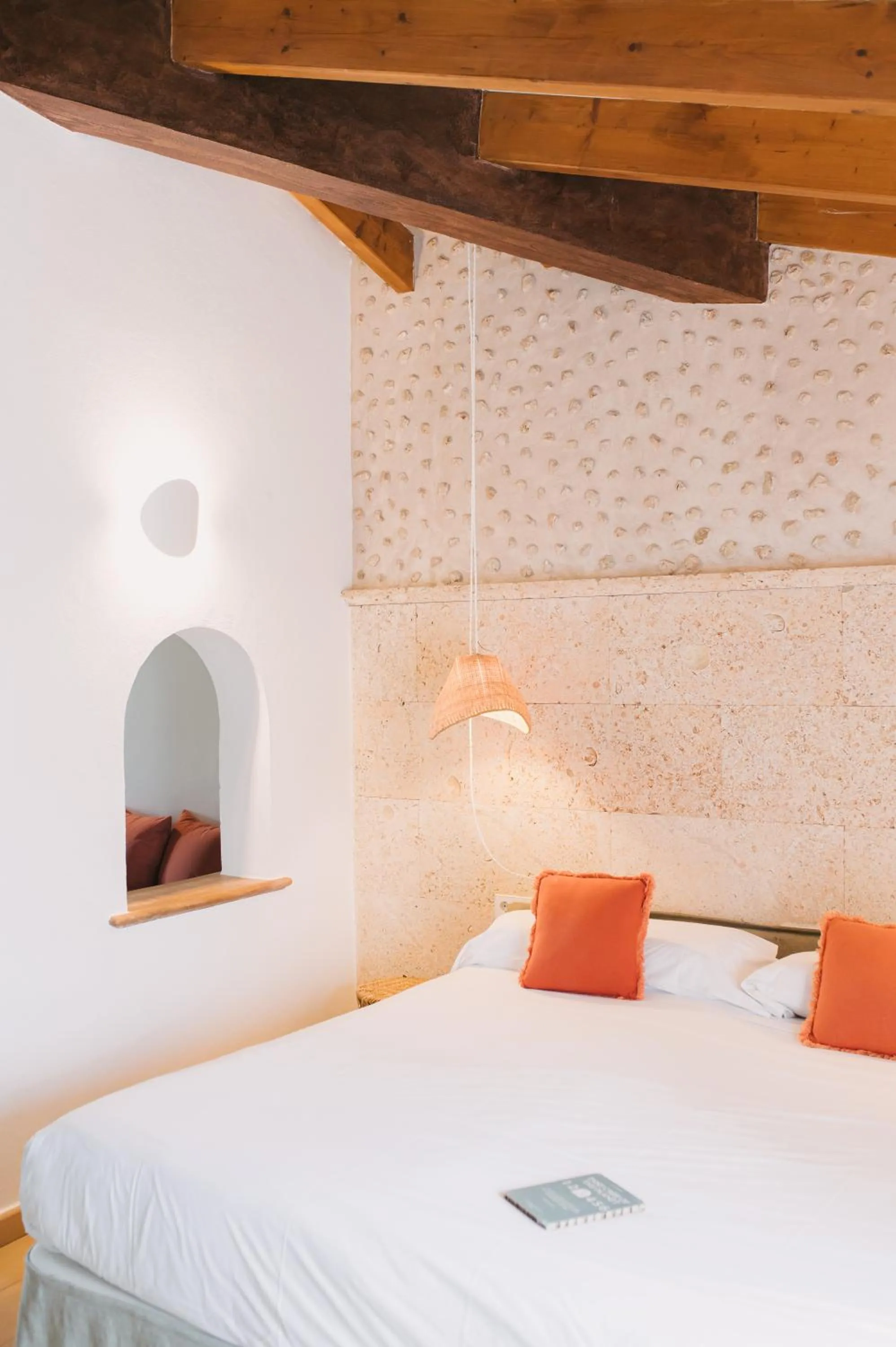 Bed in Curolla Petit Hotel