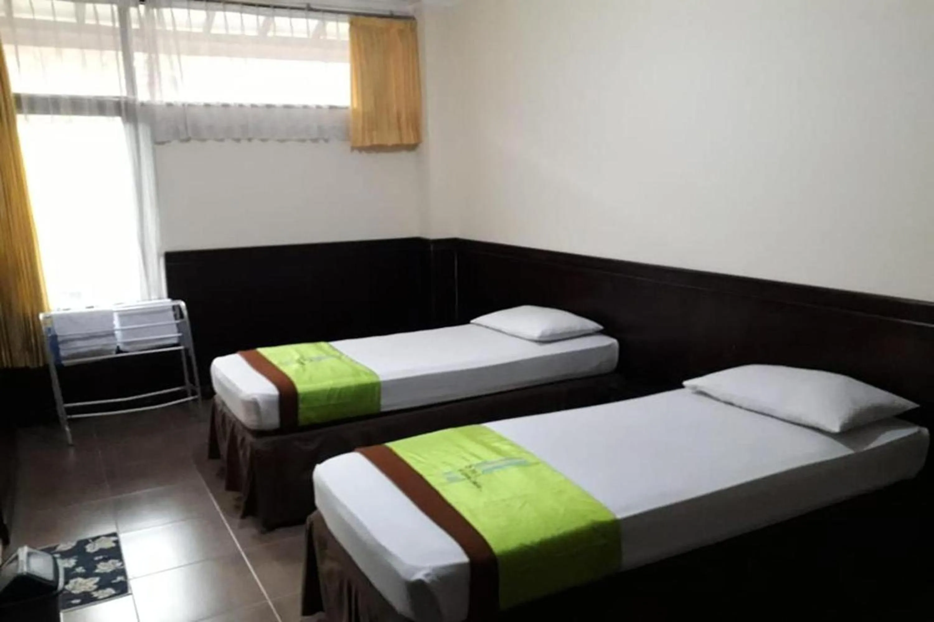 Bed in Hotel Bumi Makmur Indah