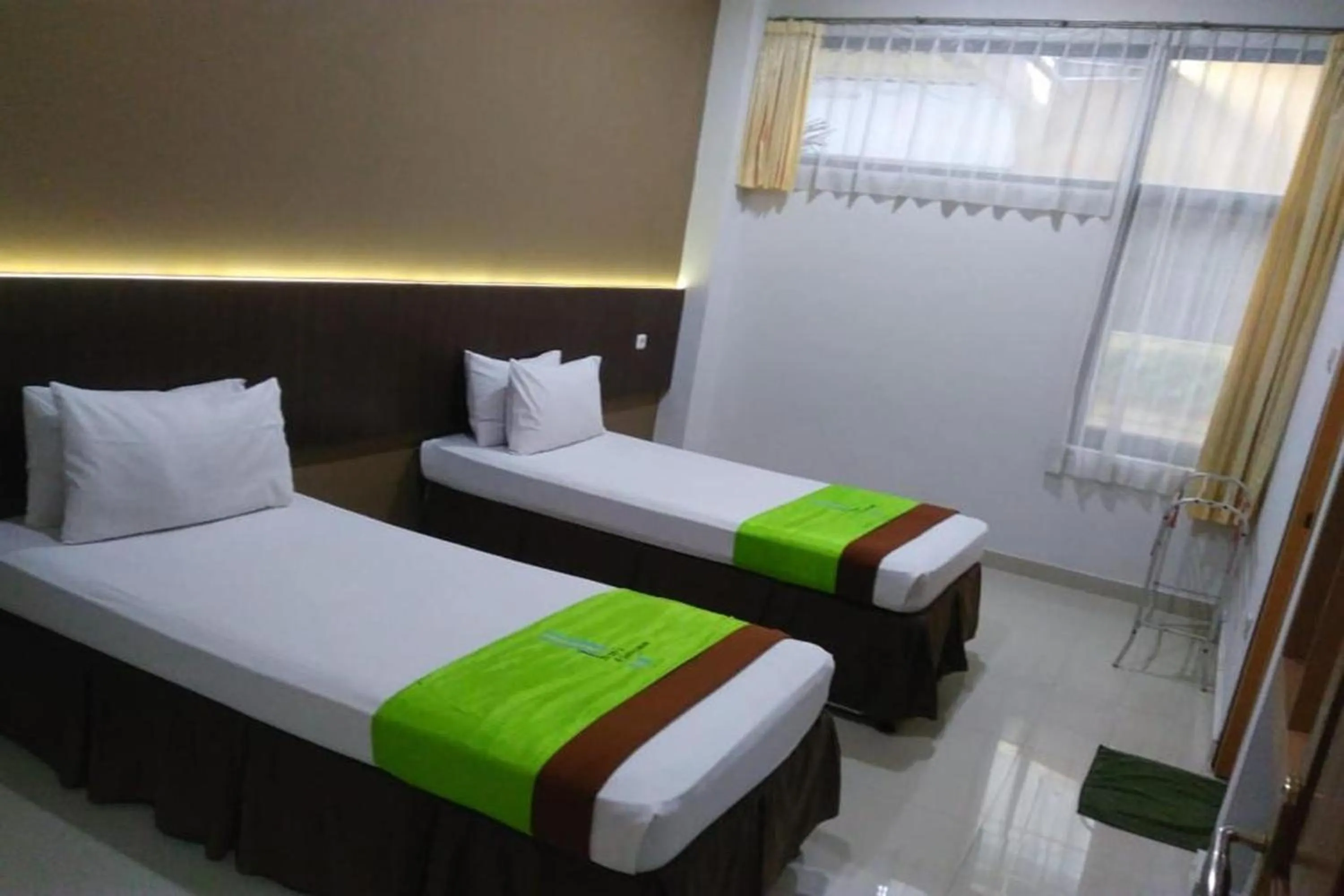 Bed in Hotel Bumi Makmur Indah