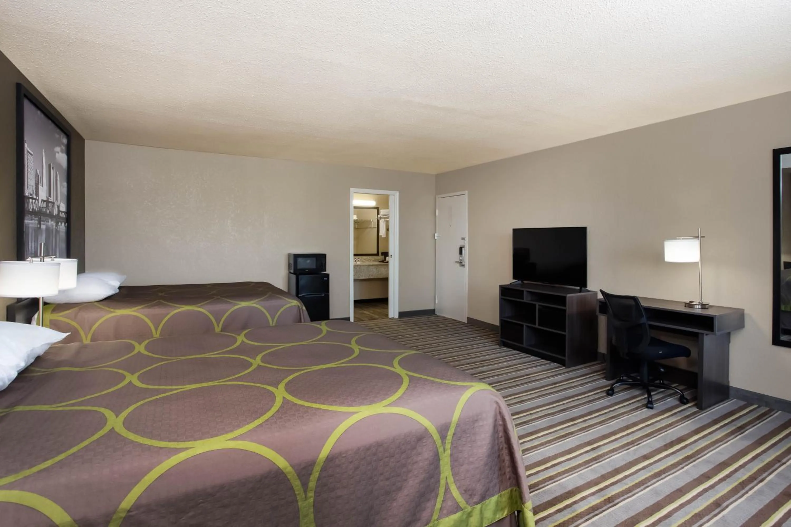 Photo of the whole room, Bed in Travel Inn Of Sidney Ohio