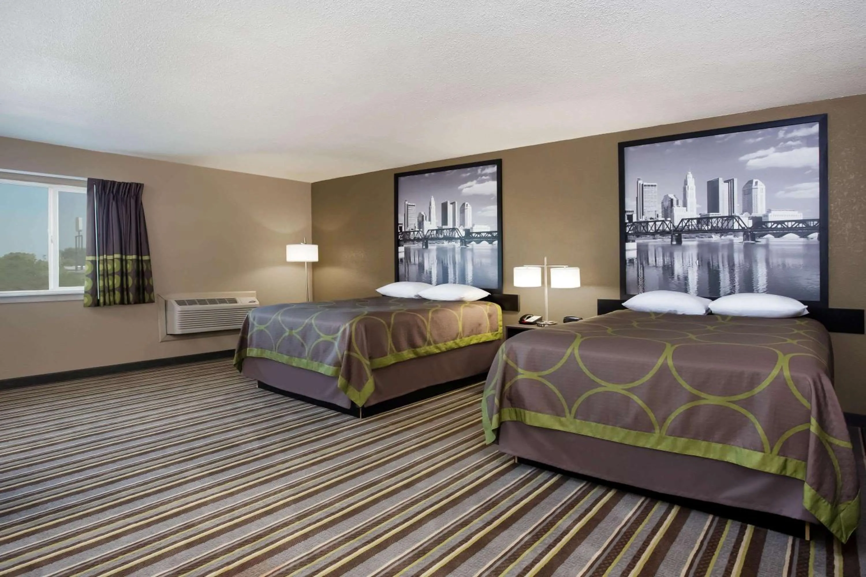 Photo of the whole room, Bed in Travel Inn Of Sidney Ohio