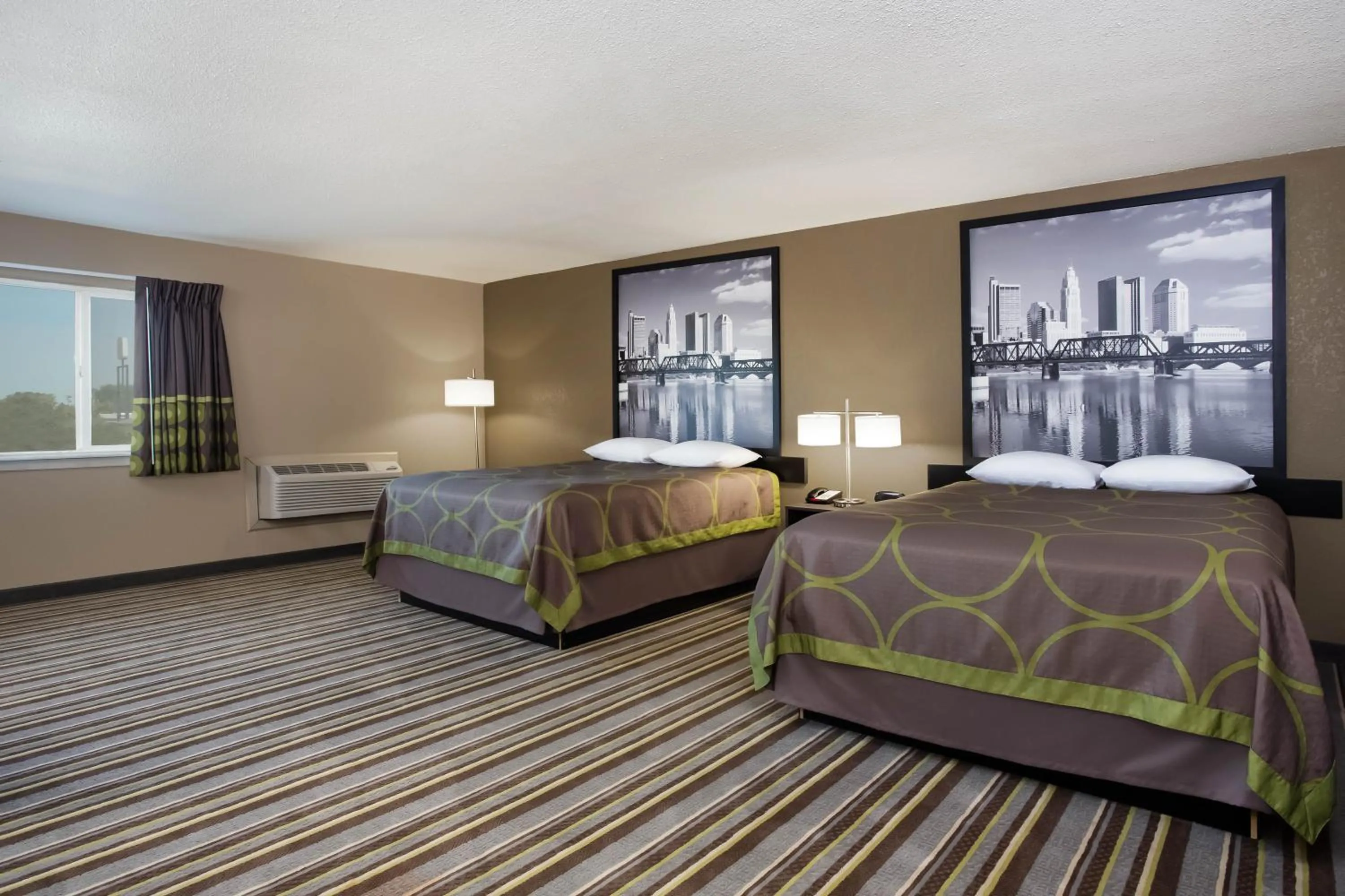 Photo of the whole room, Bed in Travel Inn Of Sidney Ohio