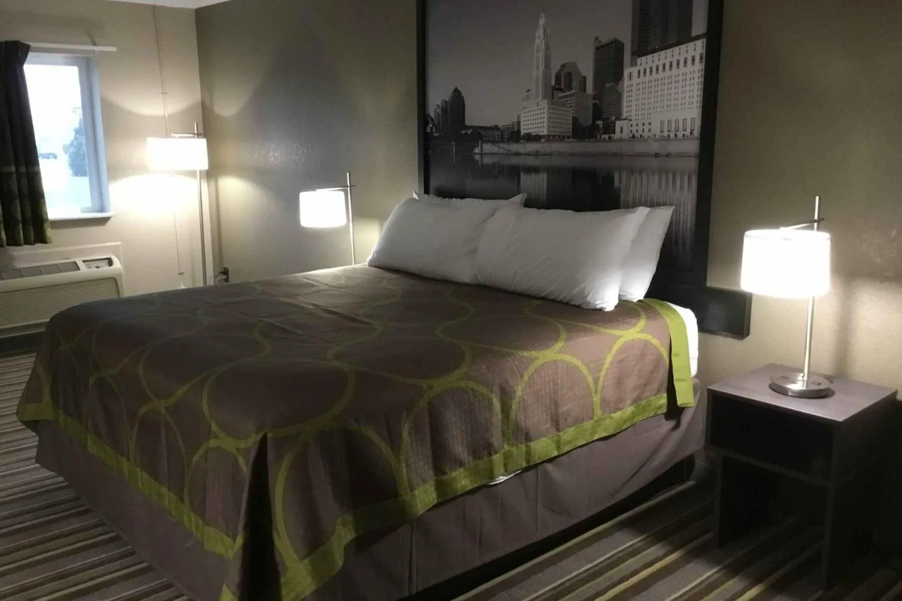 Photo of the whole room, Bed in Travel Inn Of Sidney Ohio