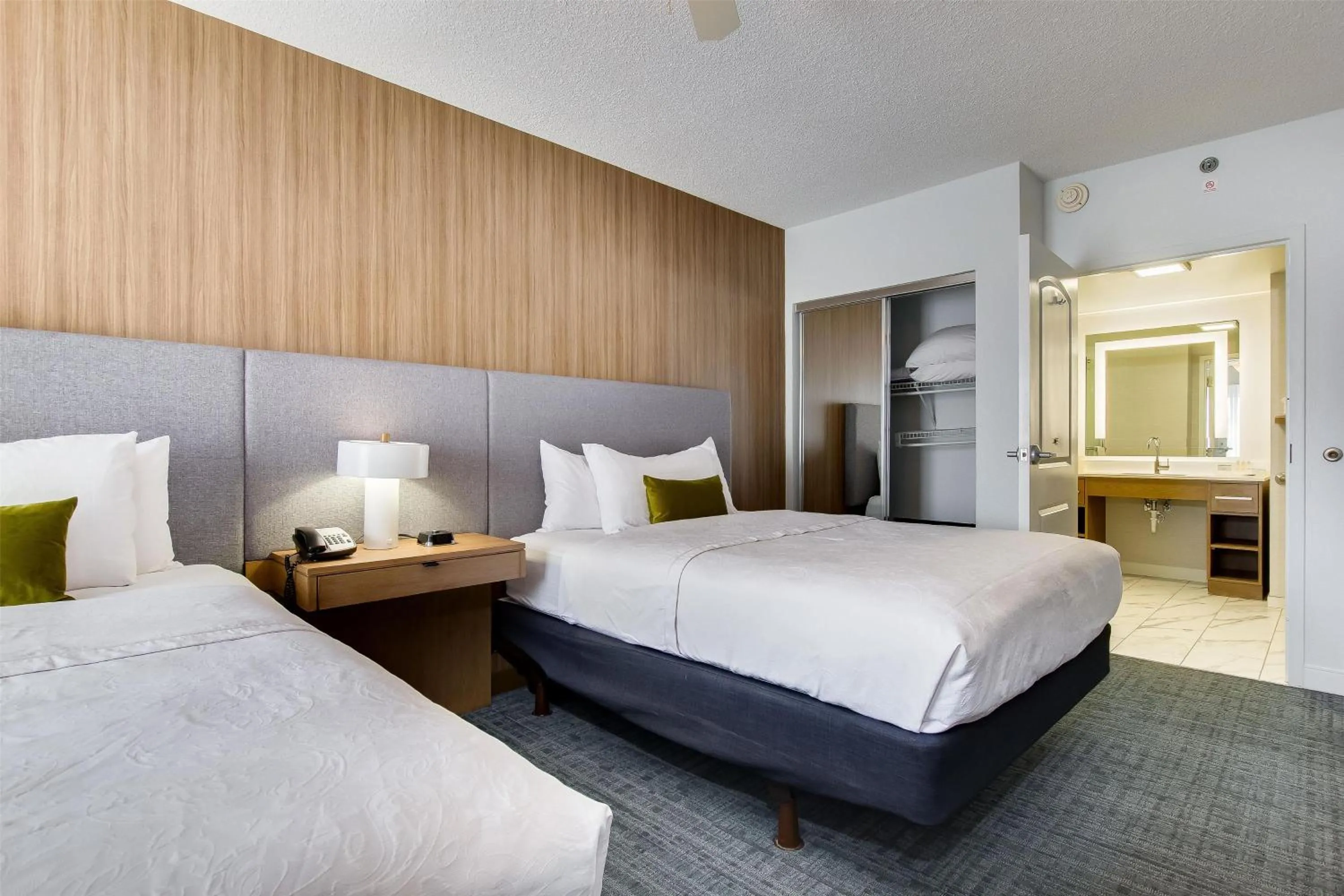 Bed in Homewood Suites by Hilton Louisville-East
