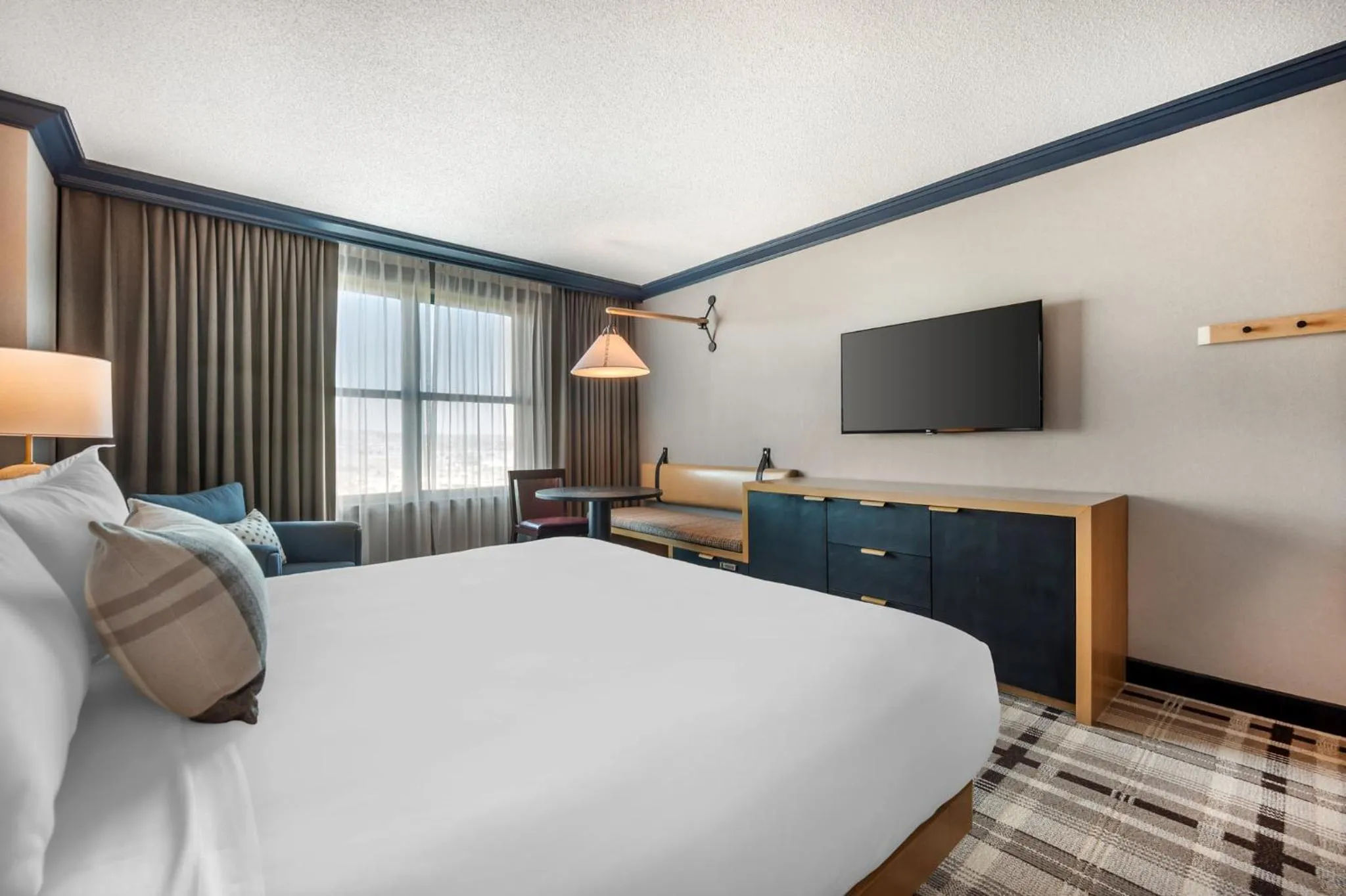 Photo of the whole room, Bed in Omni Interlocken Hotel