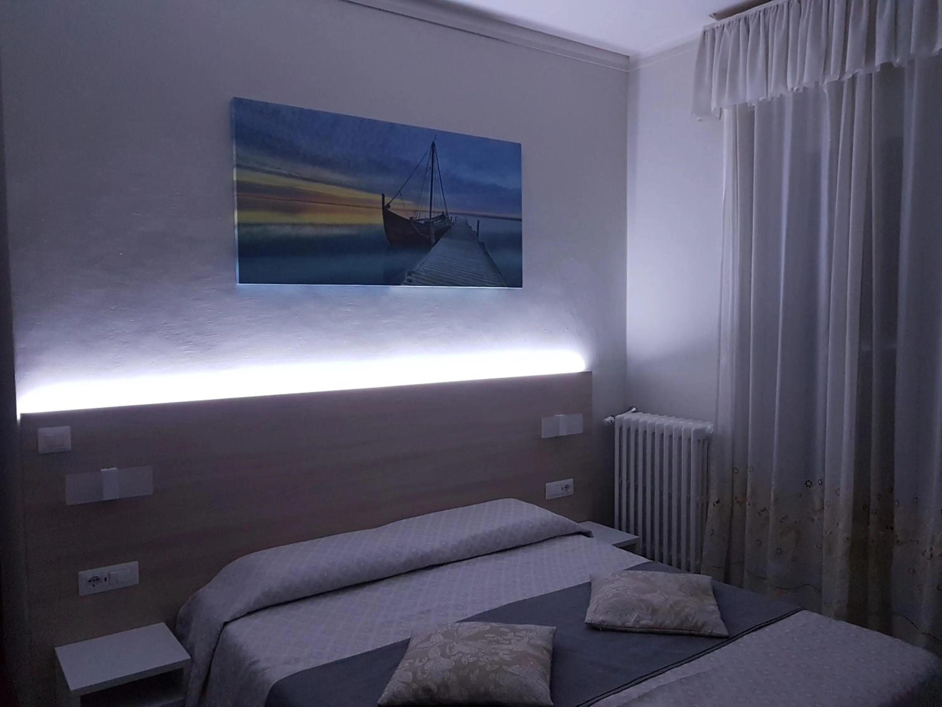 Bed in Albergo Paradiso