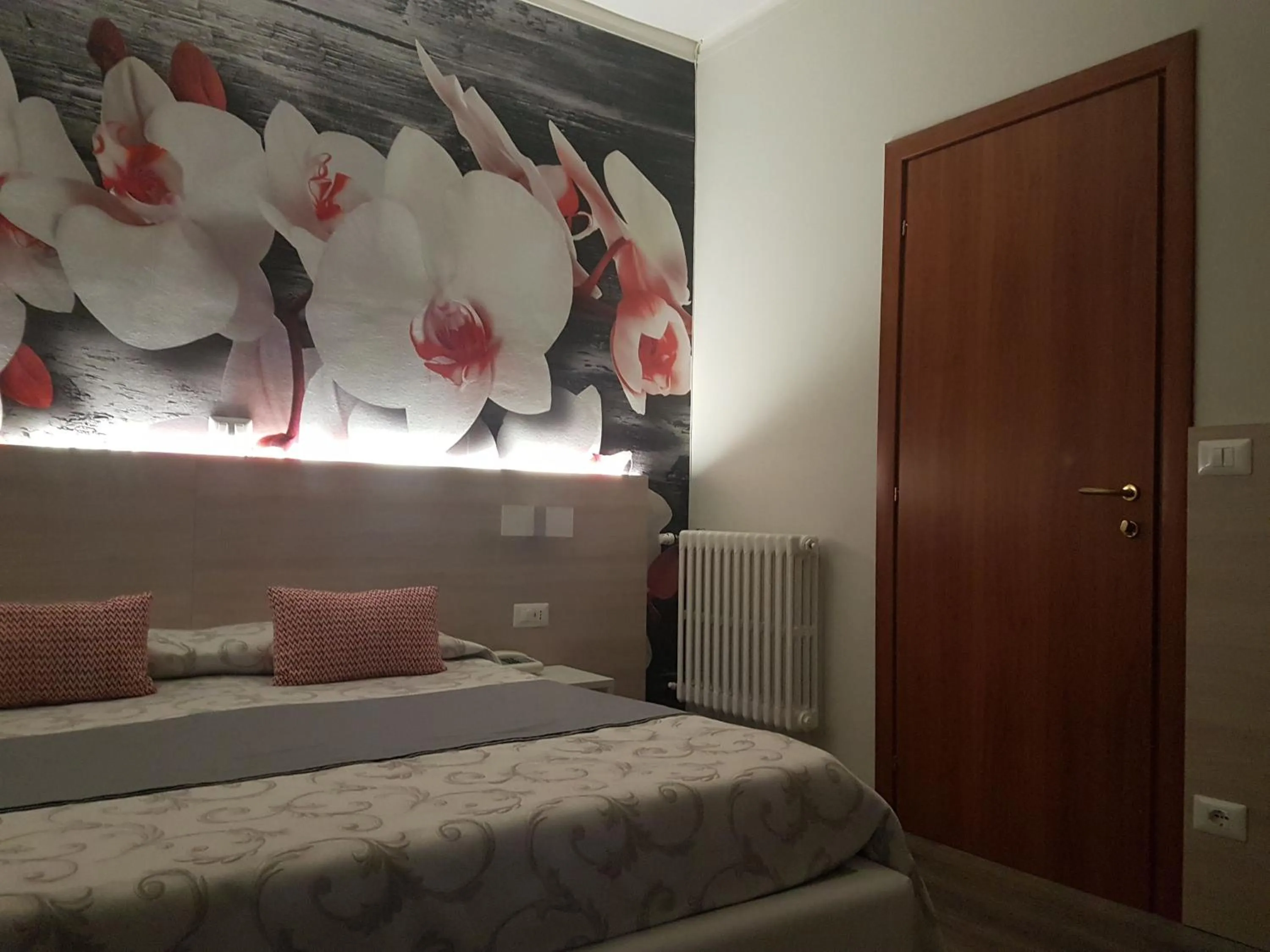 Bed in Albergo Paradiso