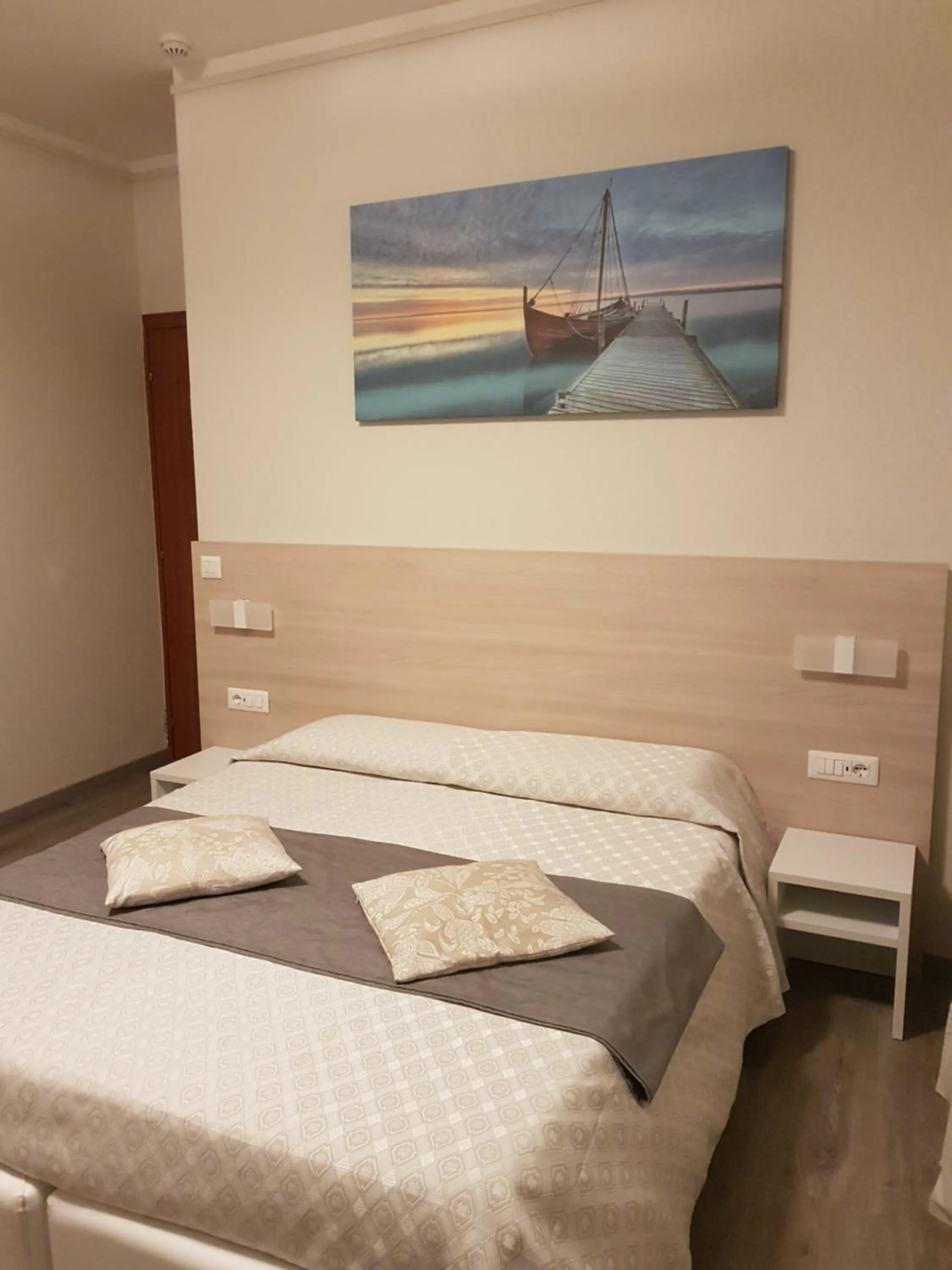 Bed in Albergo Paradiso