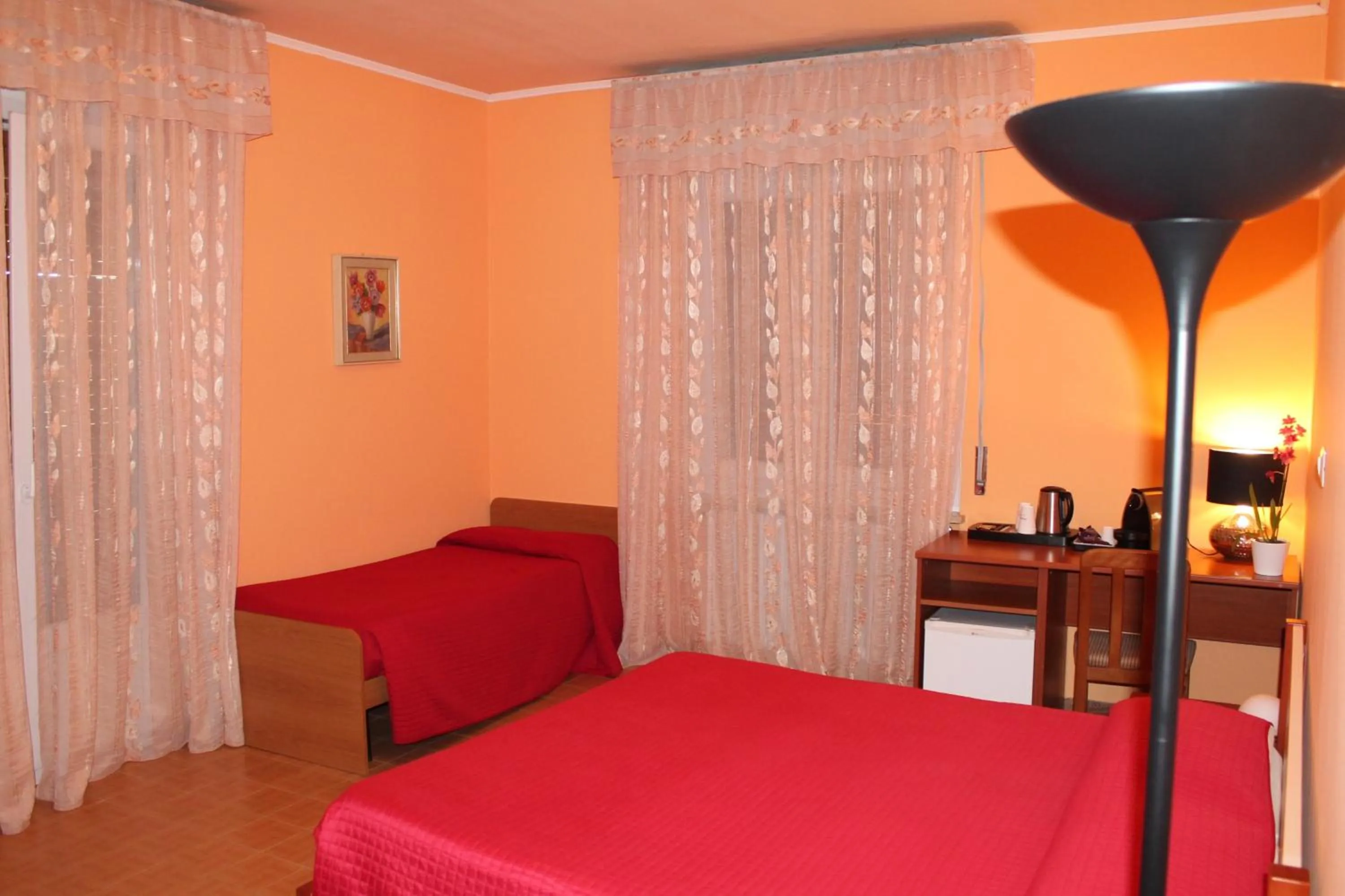 Bed in Albergo Paradiso