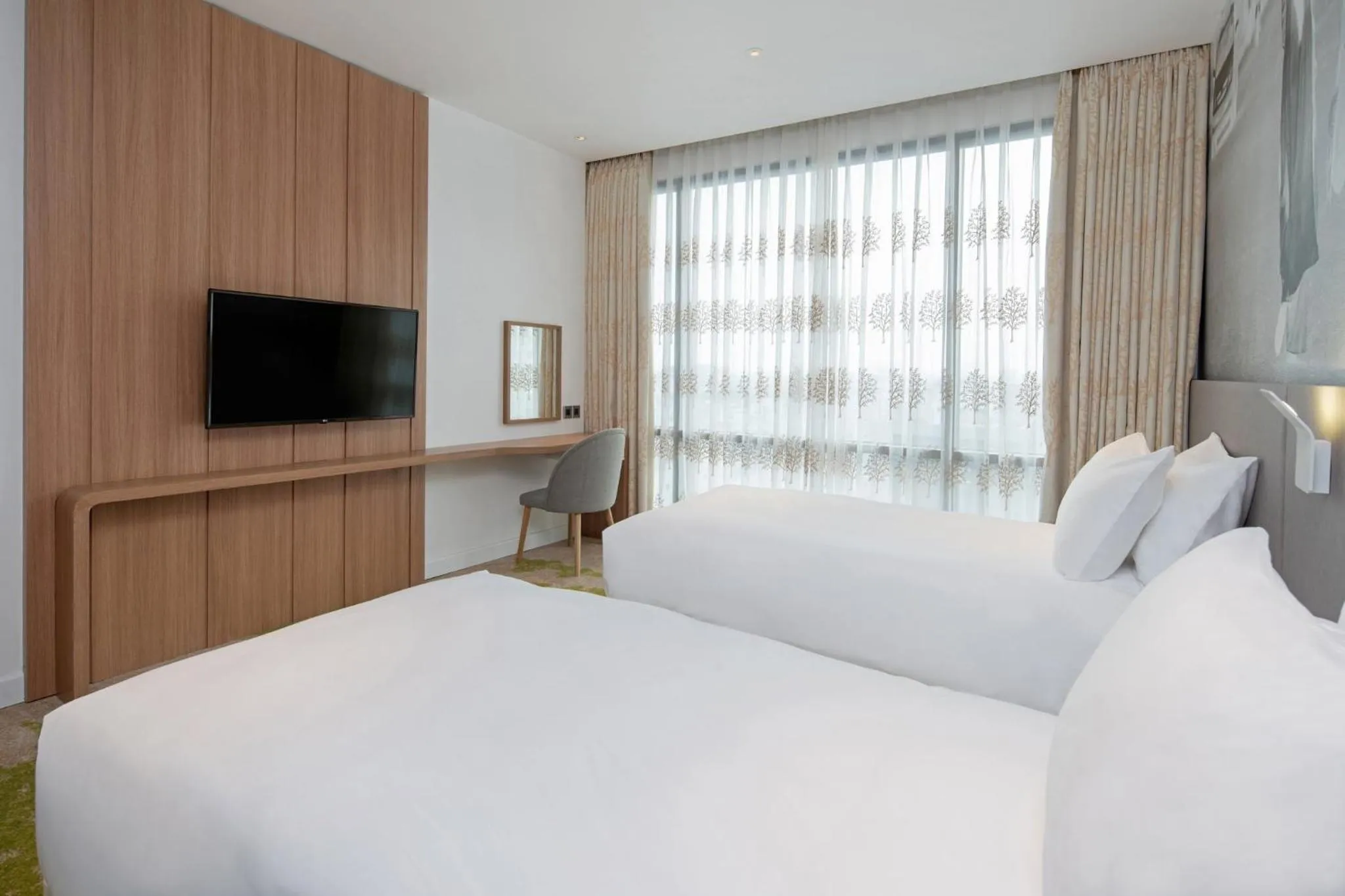 Photo of the whole room, Bed in Holiday Inn & Suites Saigon Airport by IHG