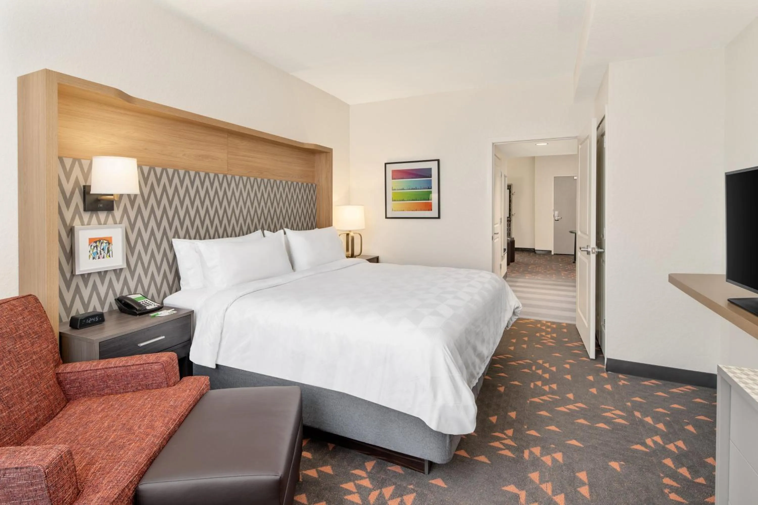 Photo of the whole room, Bed in Holiday Inn & Suites Orlando - I-Drive - Theme Parks by IHG