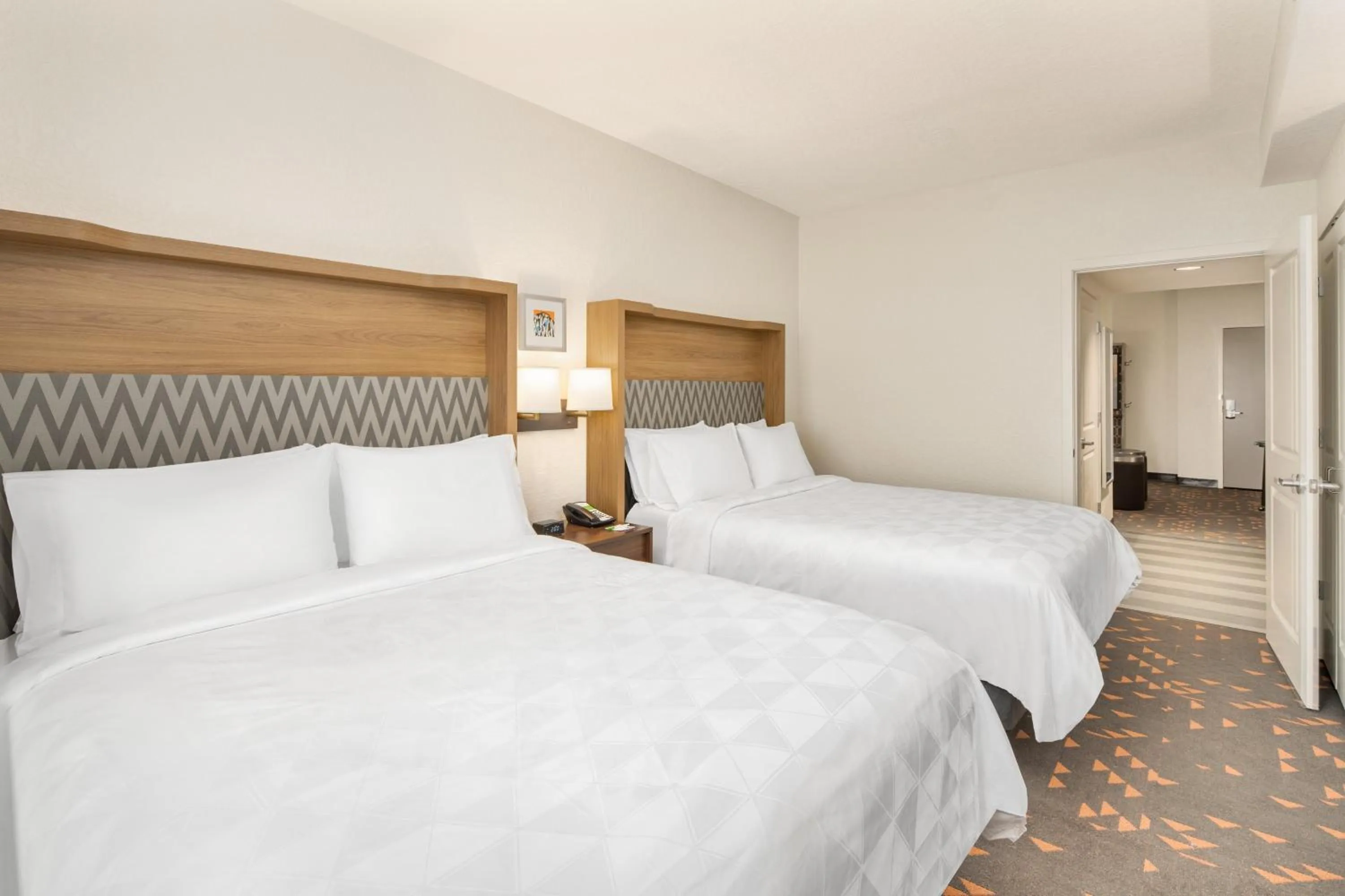 Photo of the whole room, Bed in Holiday Inn & Suites Orlando - I-Drive - Theme Parks by IHG