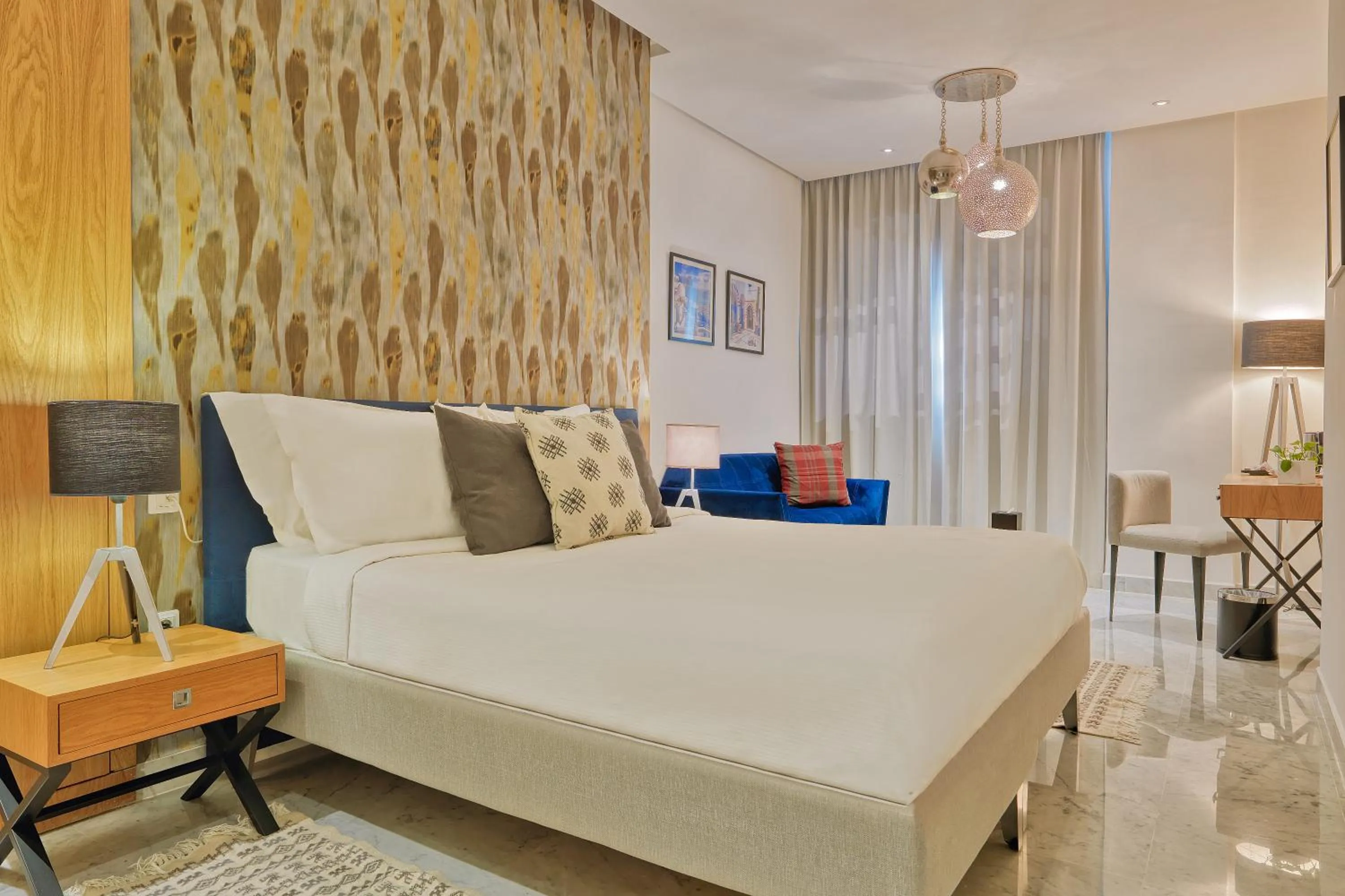 Bed in ADAM Hotel Suites