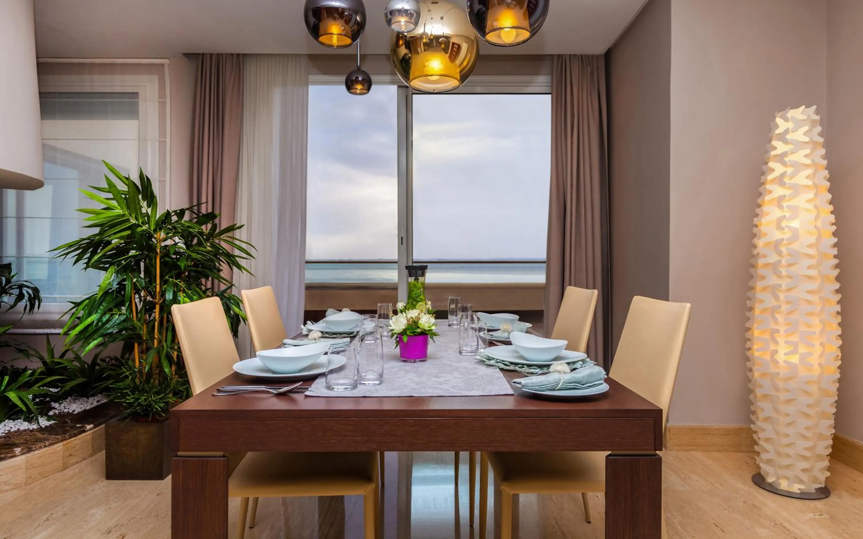 Dining area in ADAM Hotel Suites