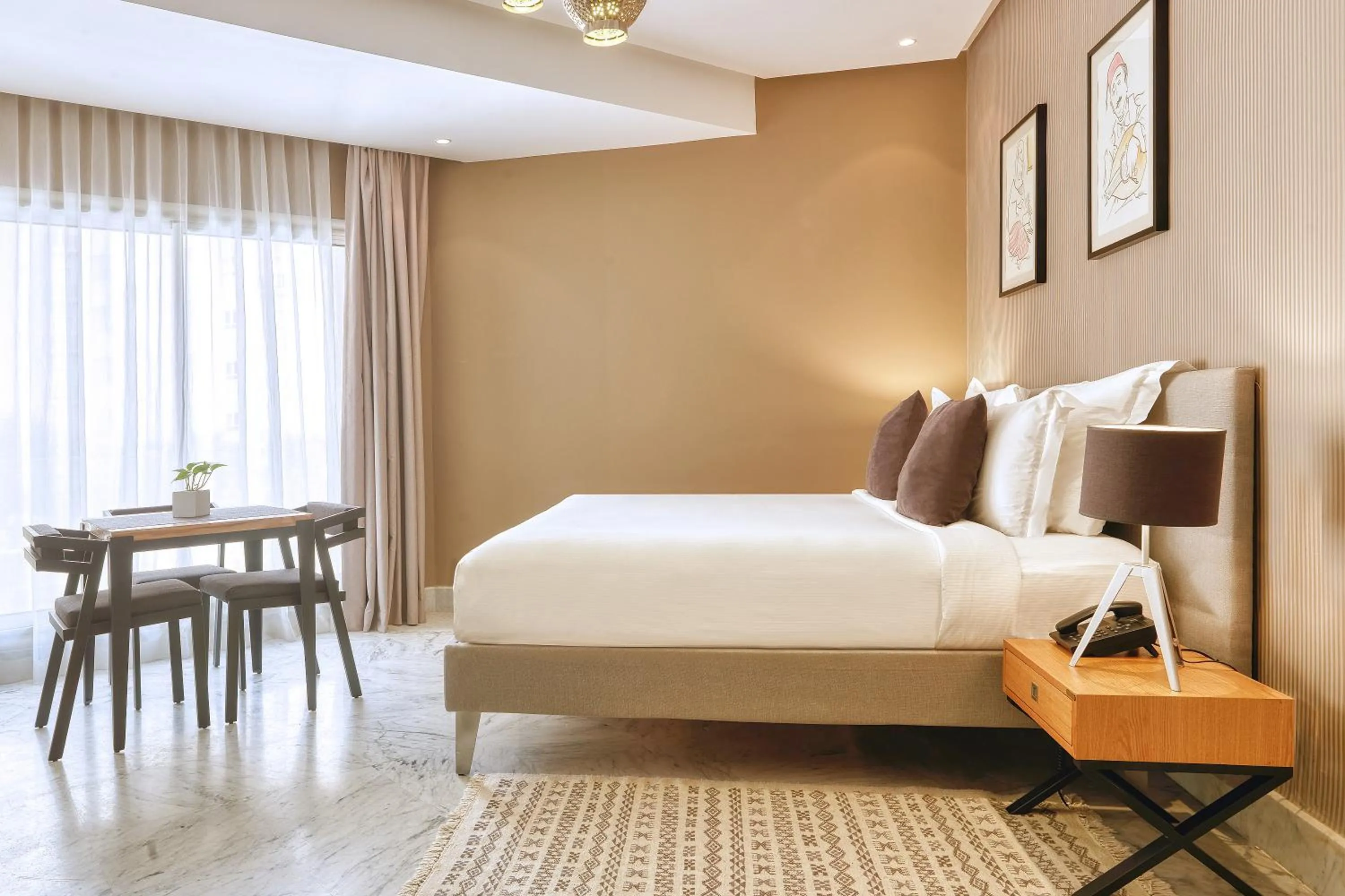 Bed in ADAM Hotel Suites