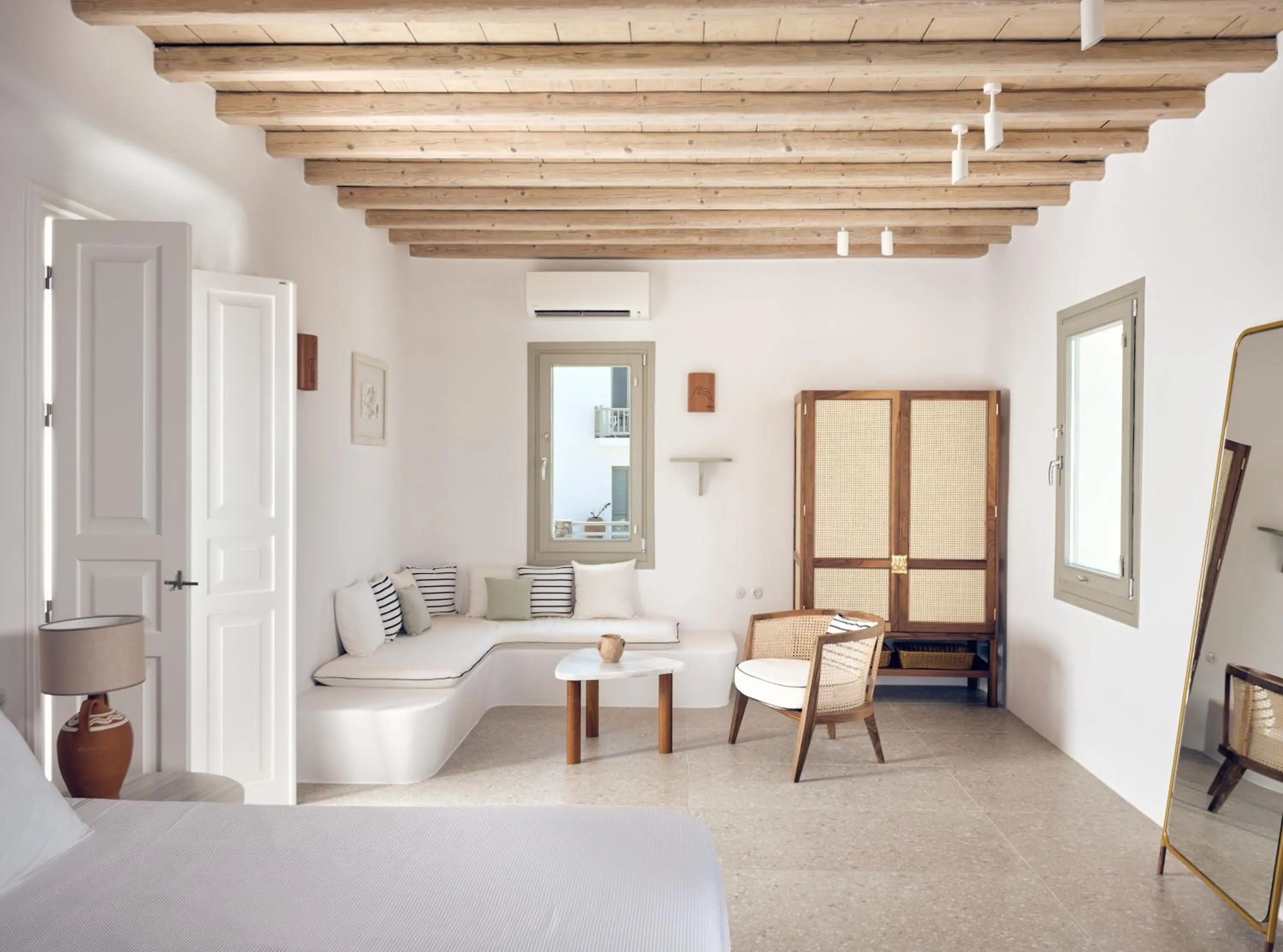 Living room, Bed in Belvedere Mykonos - Hilltop Rooms & Suites - The Leading Hotels of the World