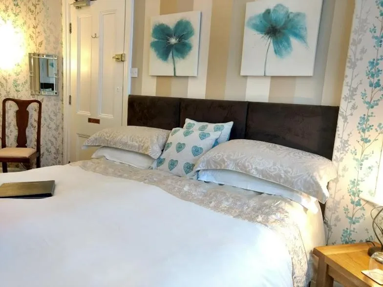 Bed in Rutland West Guest House