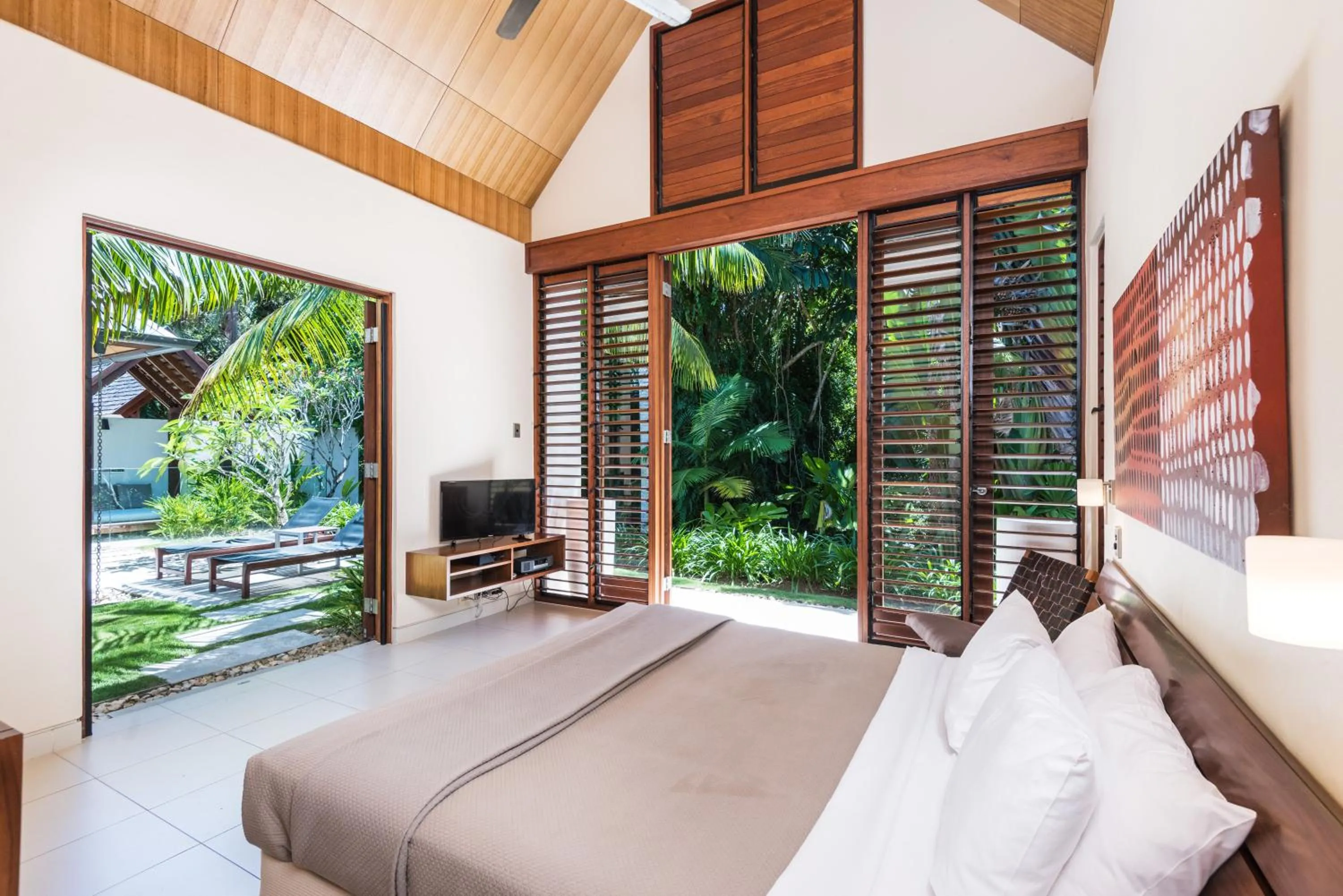 Bedroom, Bed in Niramaya Villas and Spa