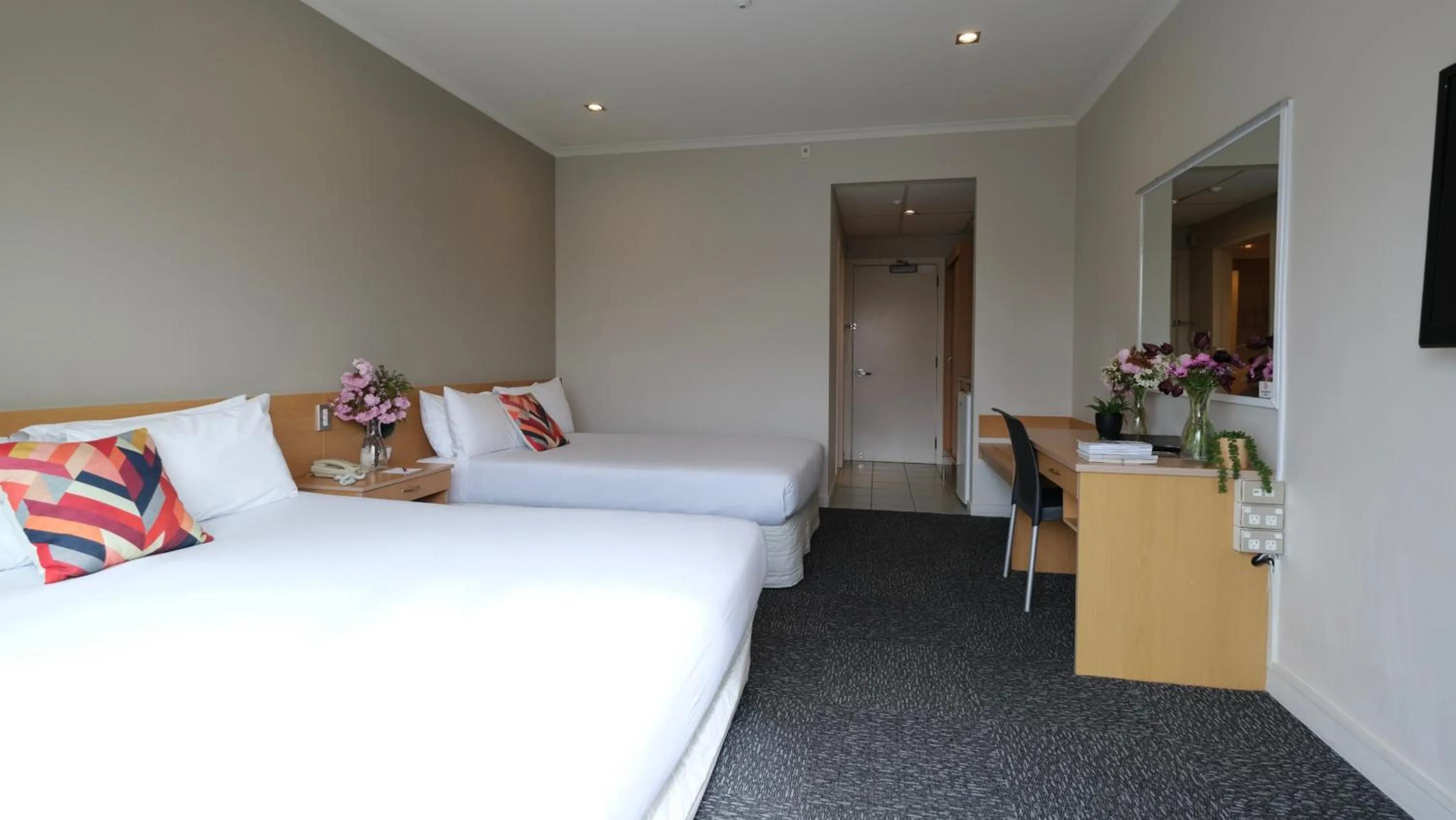 Bed in The Garden Hotel