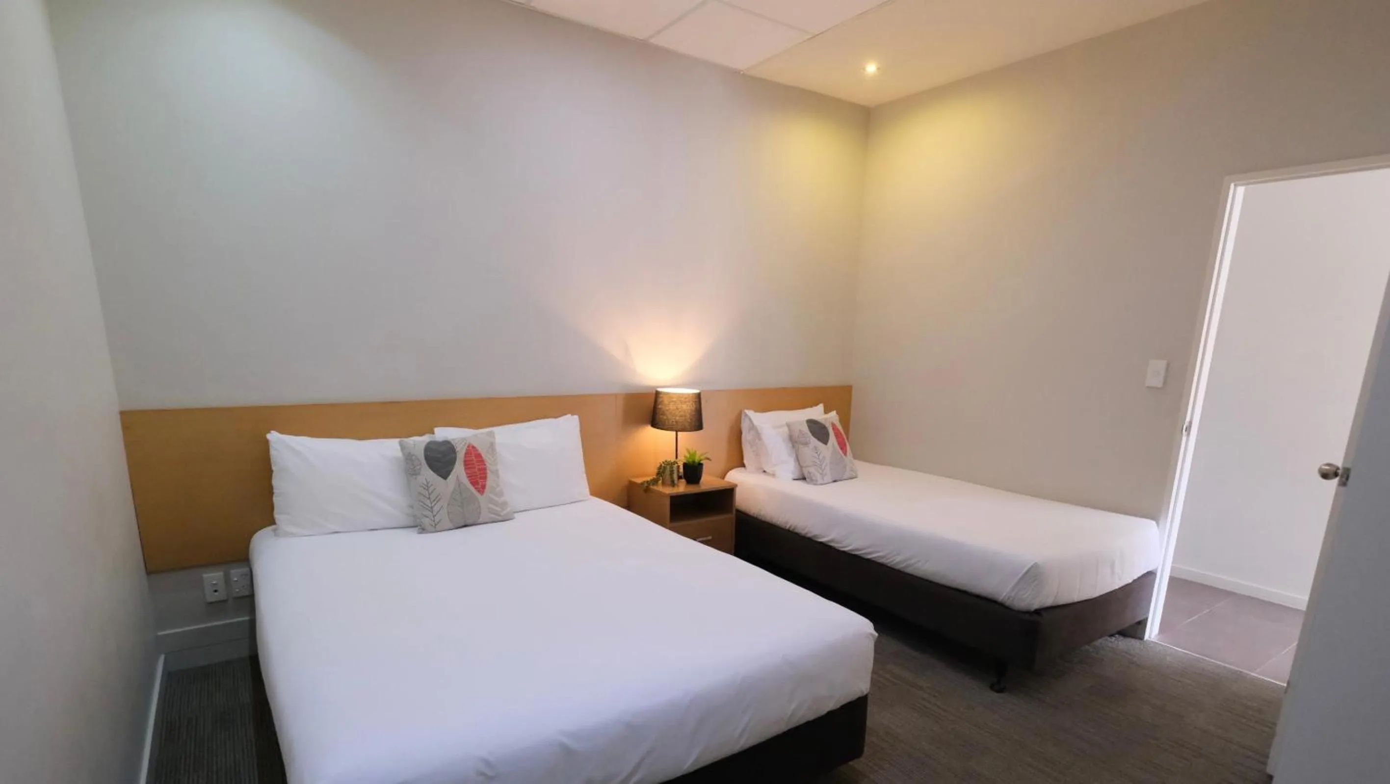 Bed in The Garden Hotel