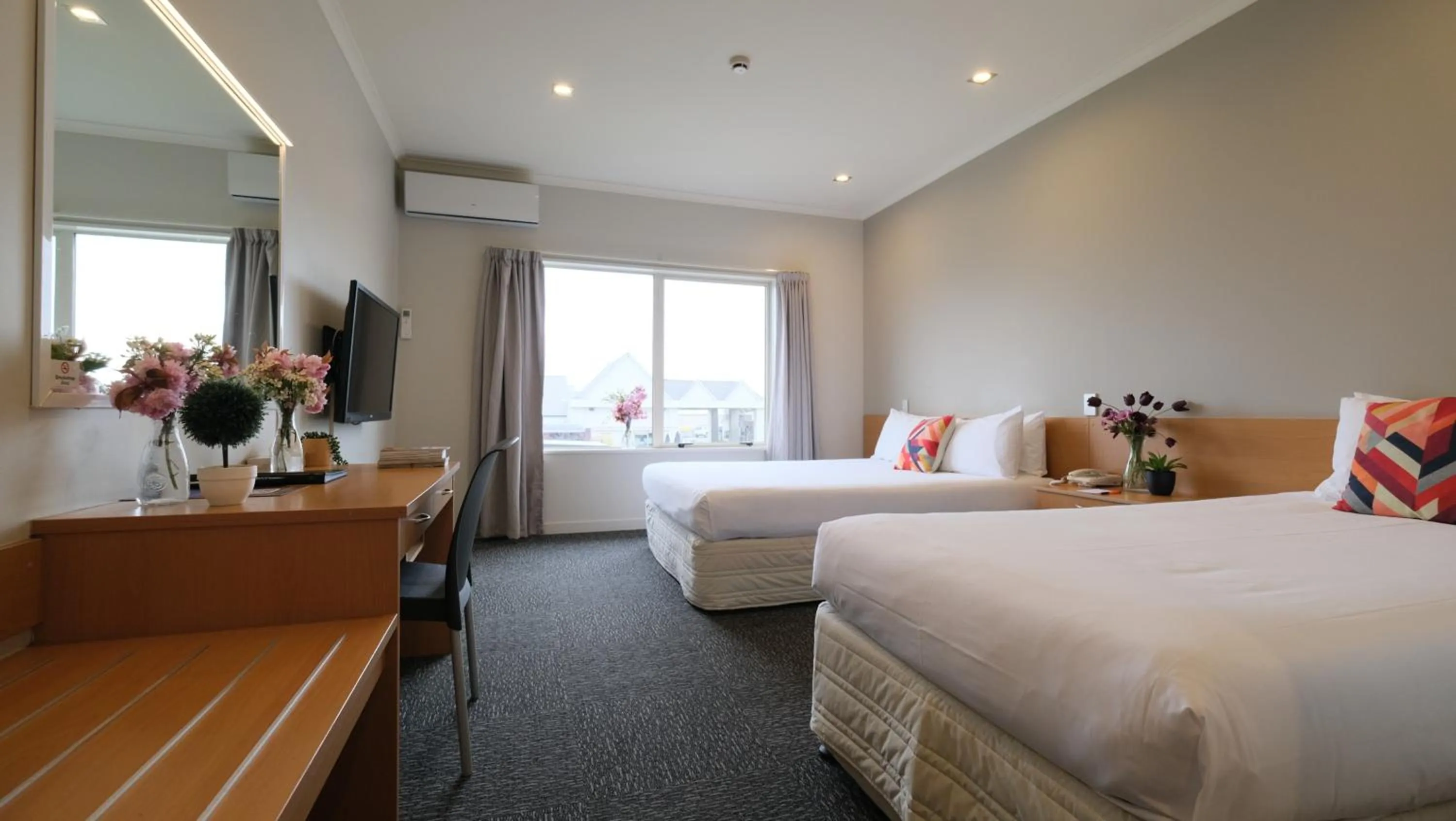 Bed in The Garden Hotel