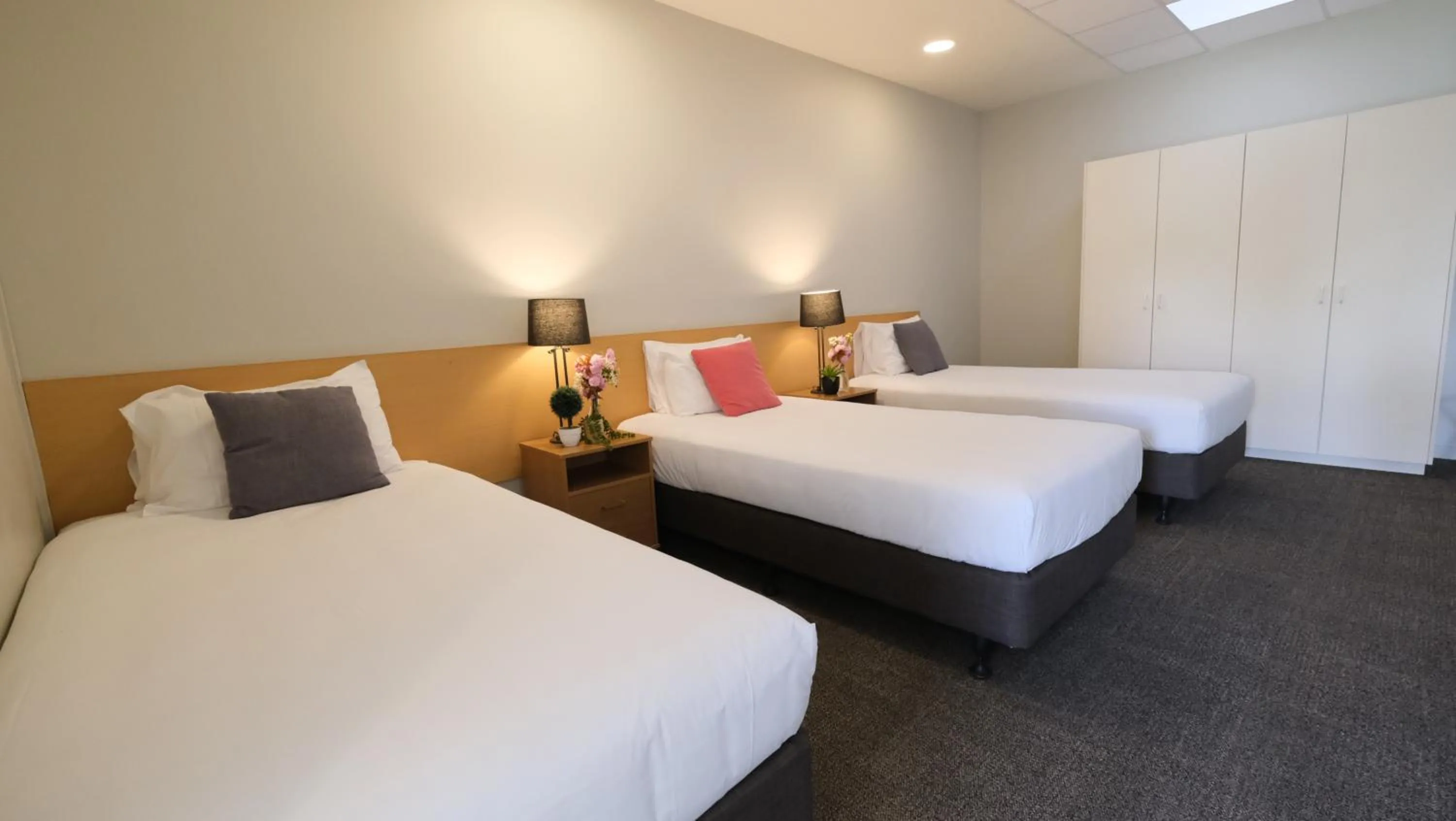 Bed in The Garden Hotel