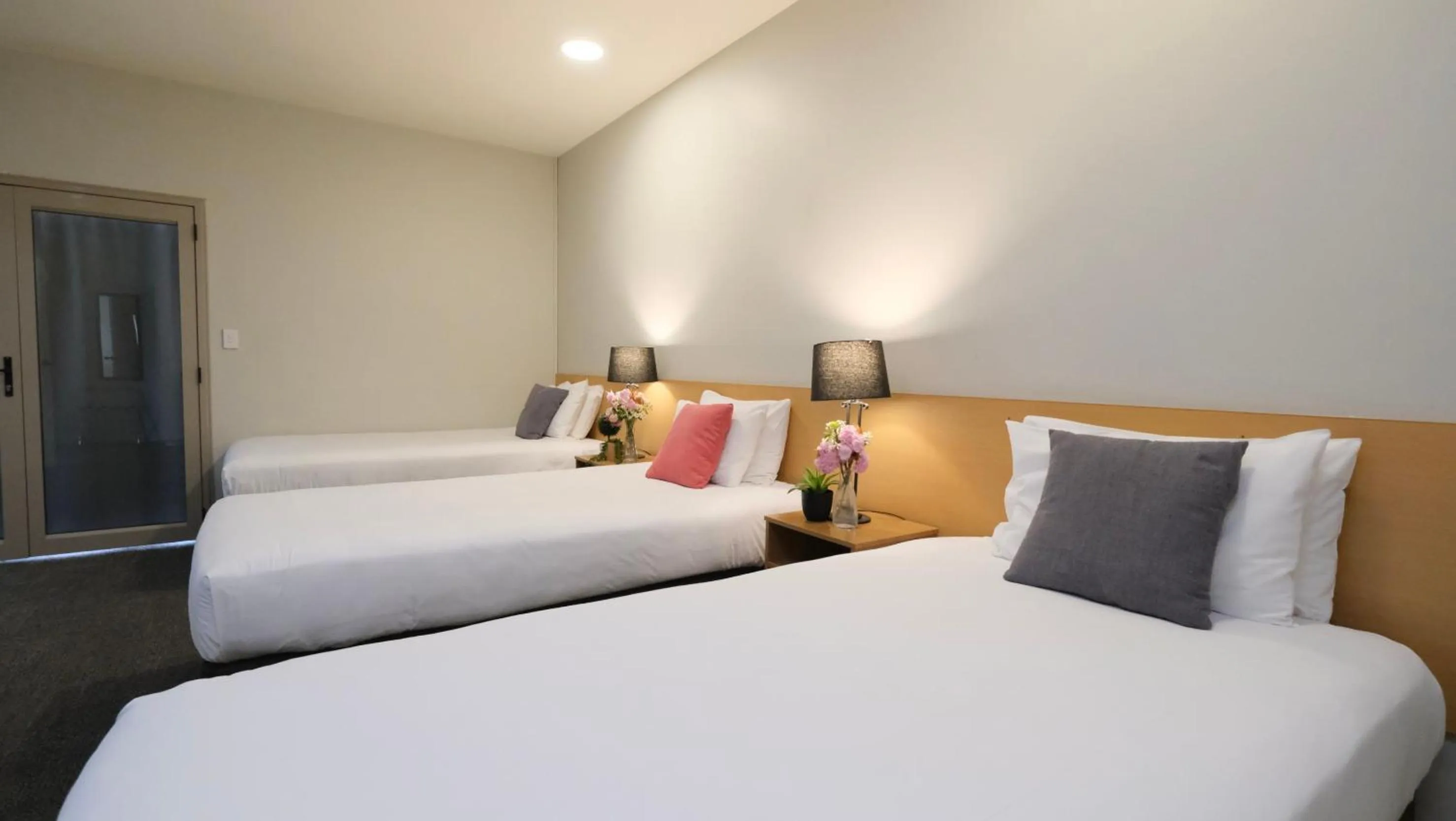 Bed in The Garden Hotel