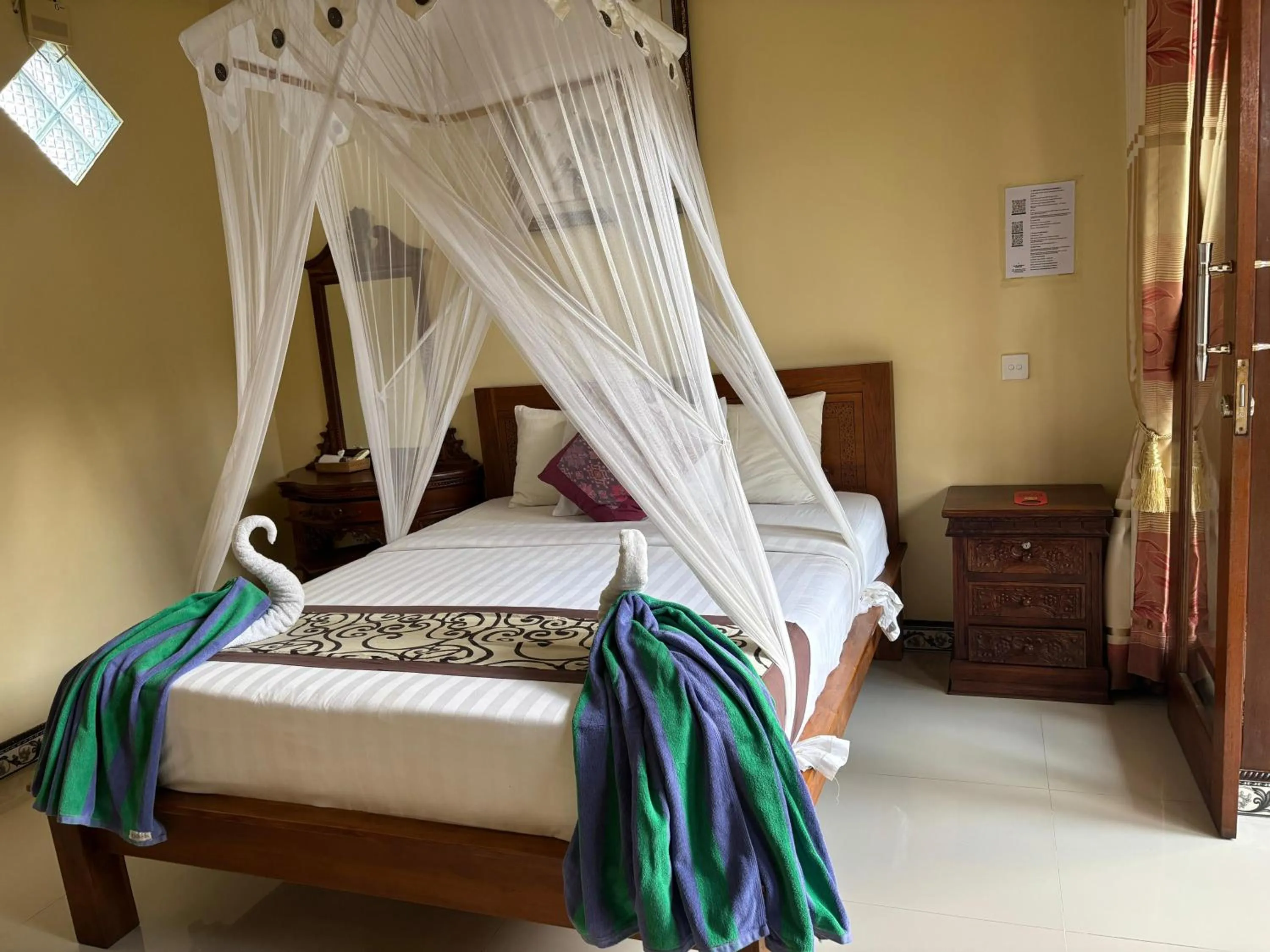 Bed in Suparsa's Homestay