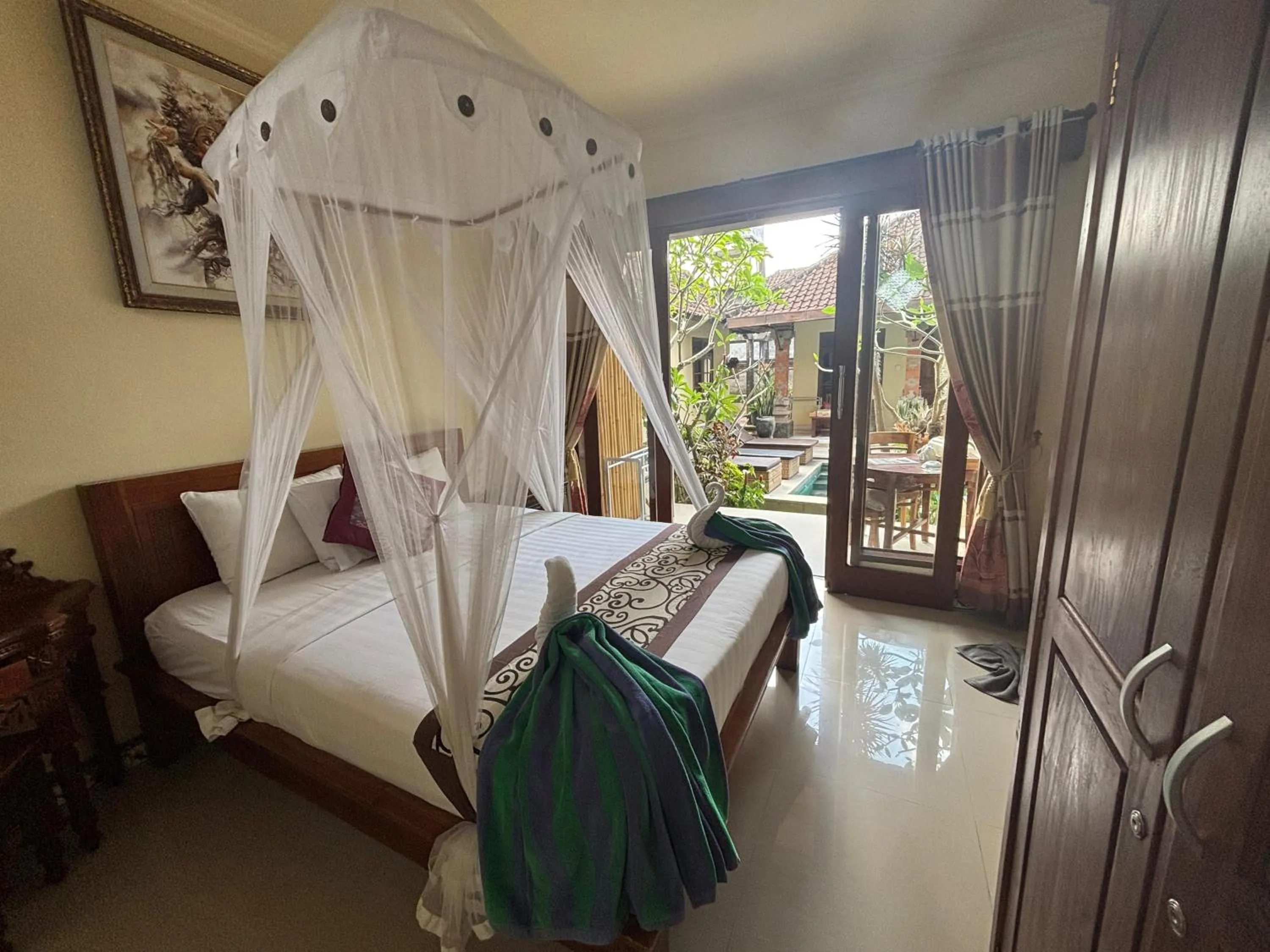 Bed in Suparsa's Homestay