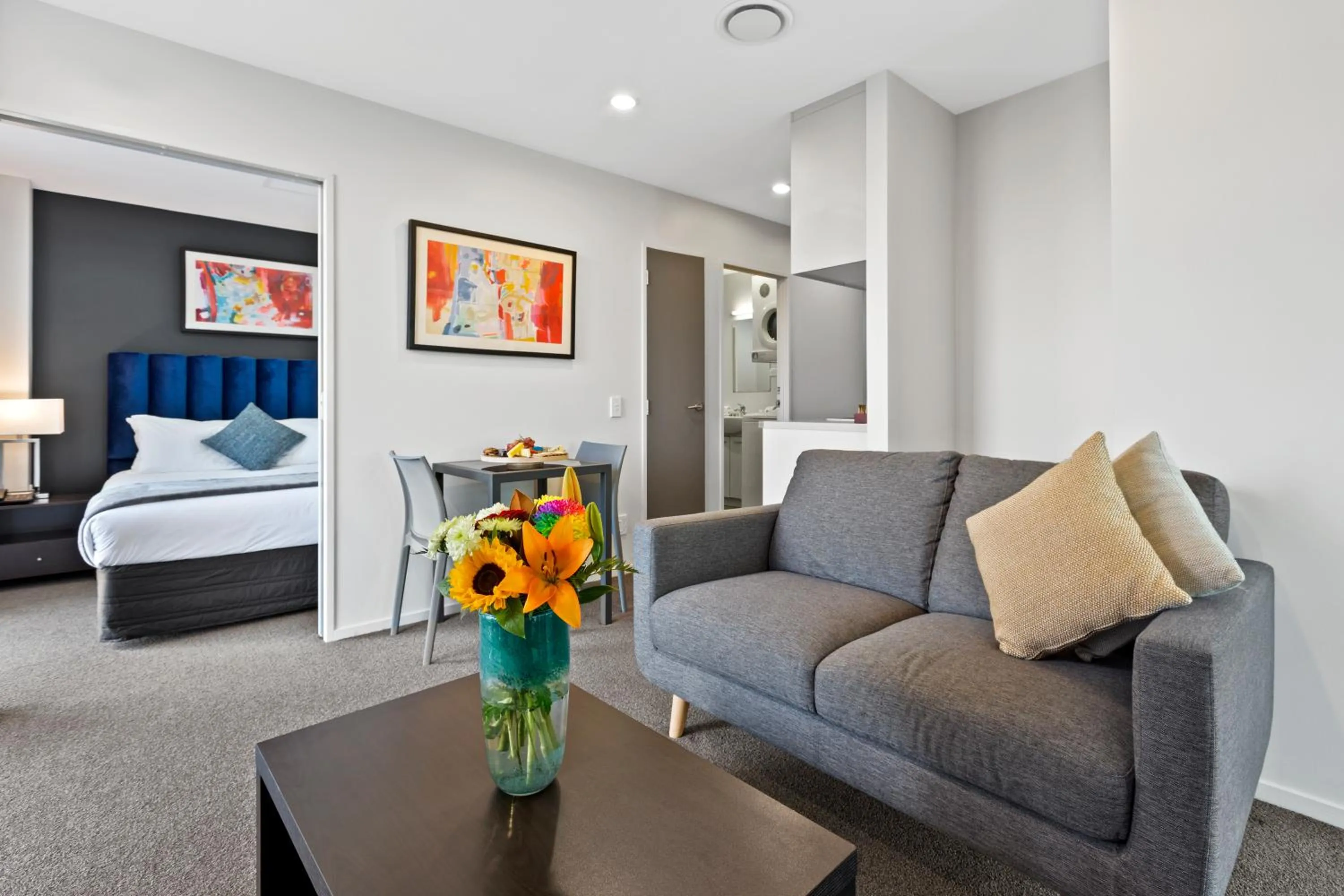 Living room, Bed in Proximity Apartments Manukau / Auckland Airport