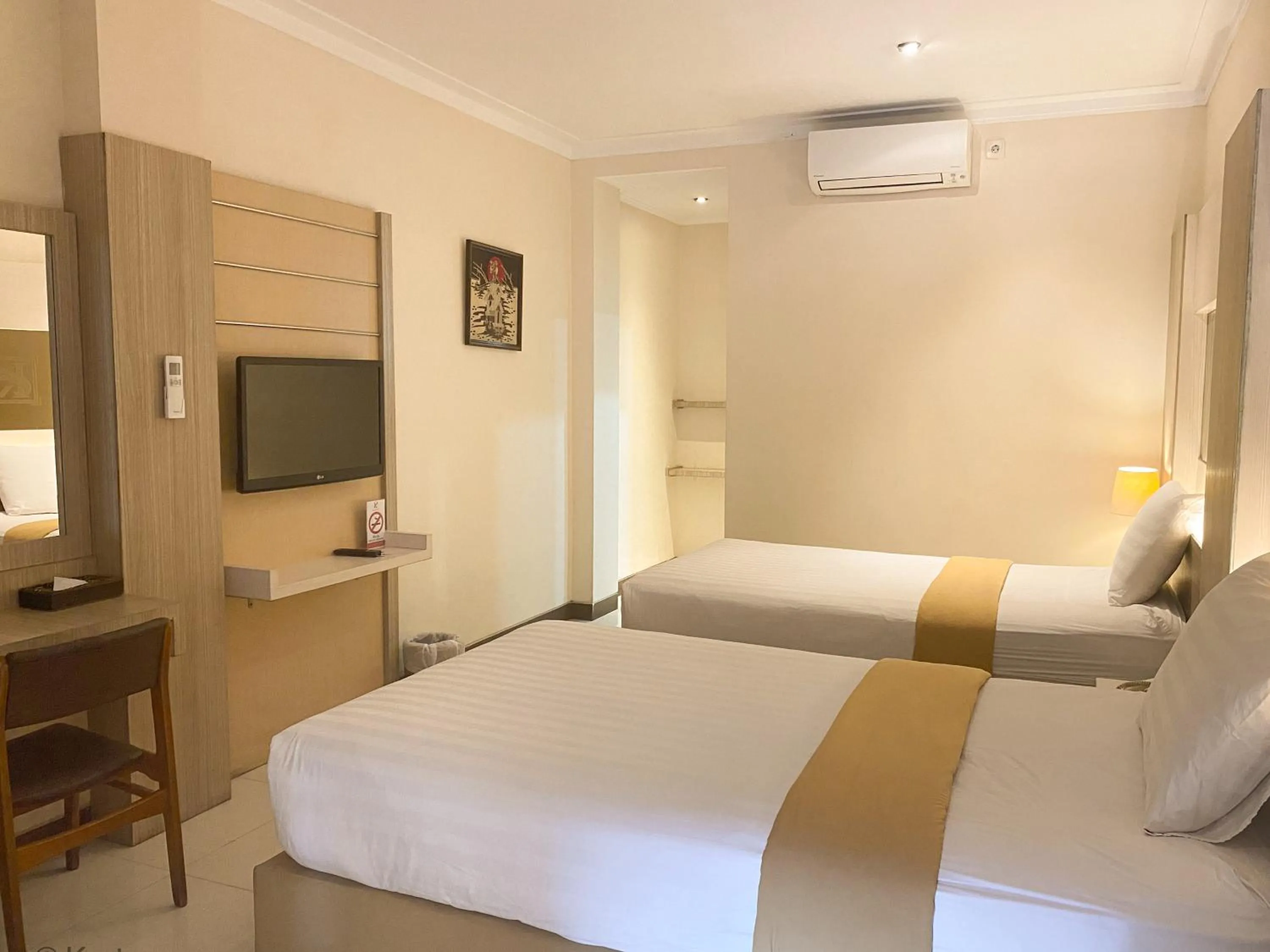Bed in Kertanegara Premium Guest House