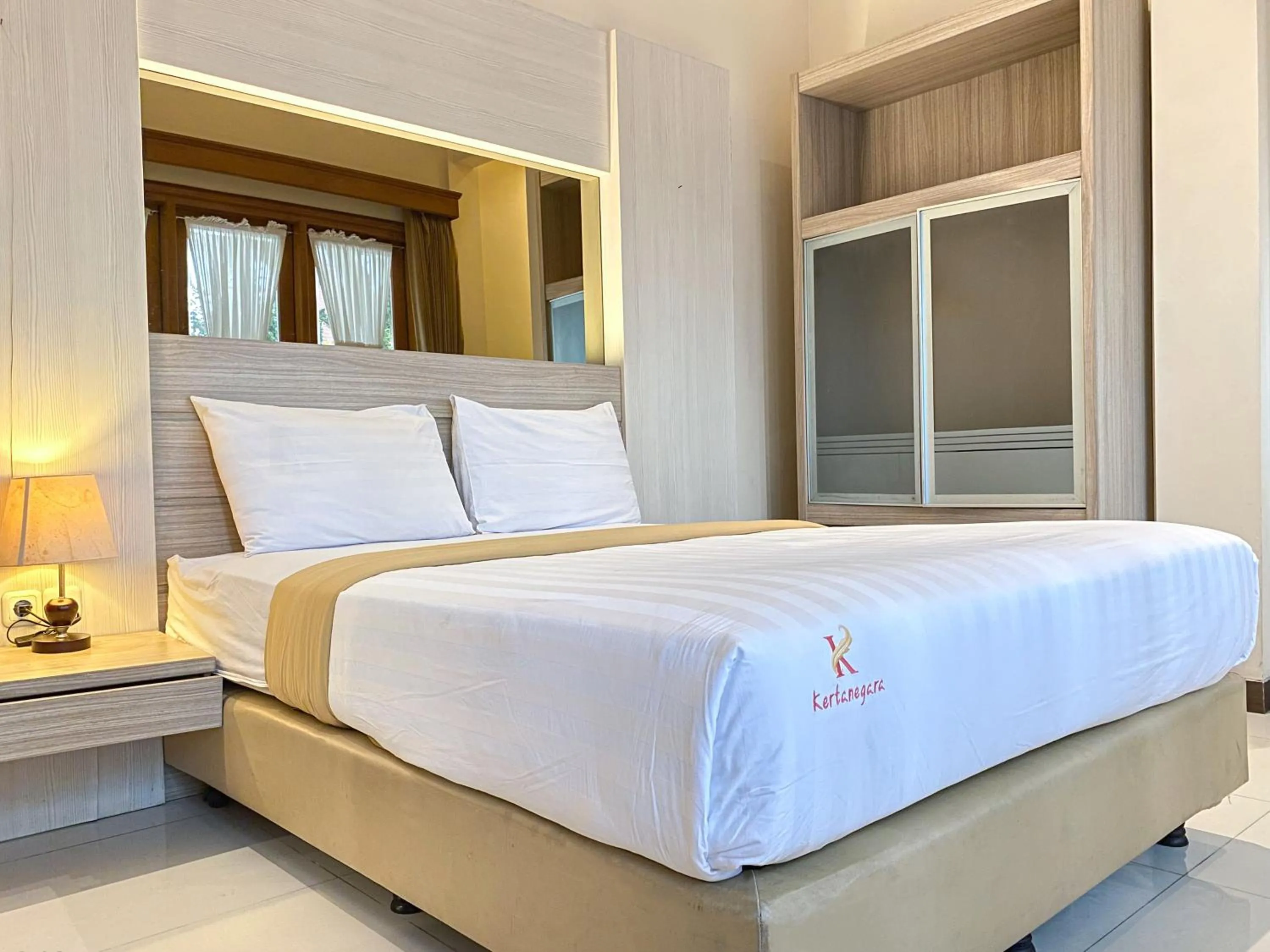 Bed in Kertanegara Premium Guest House