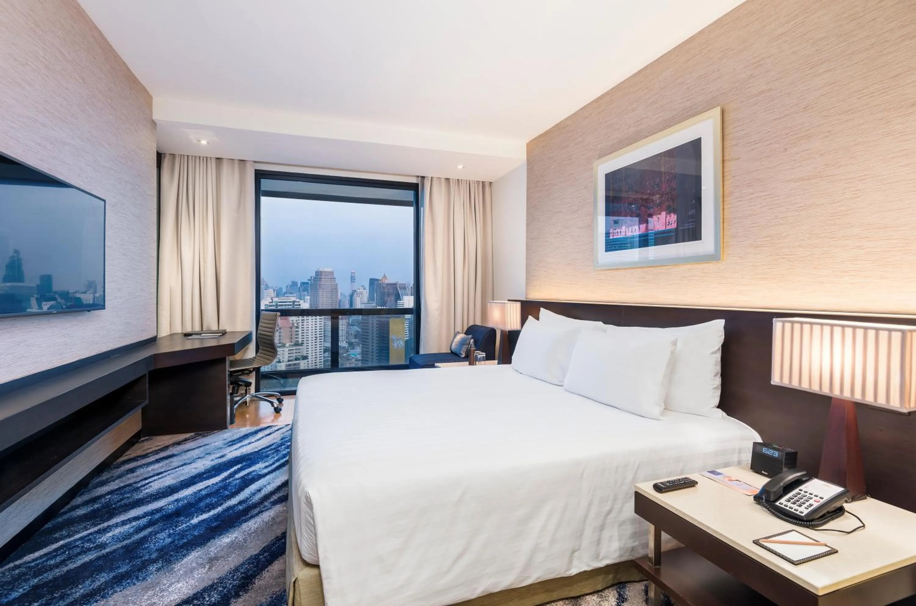 Bed in Emporium Suites by Chatrium