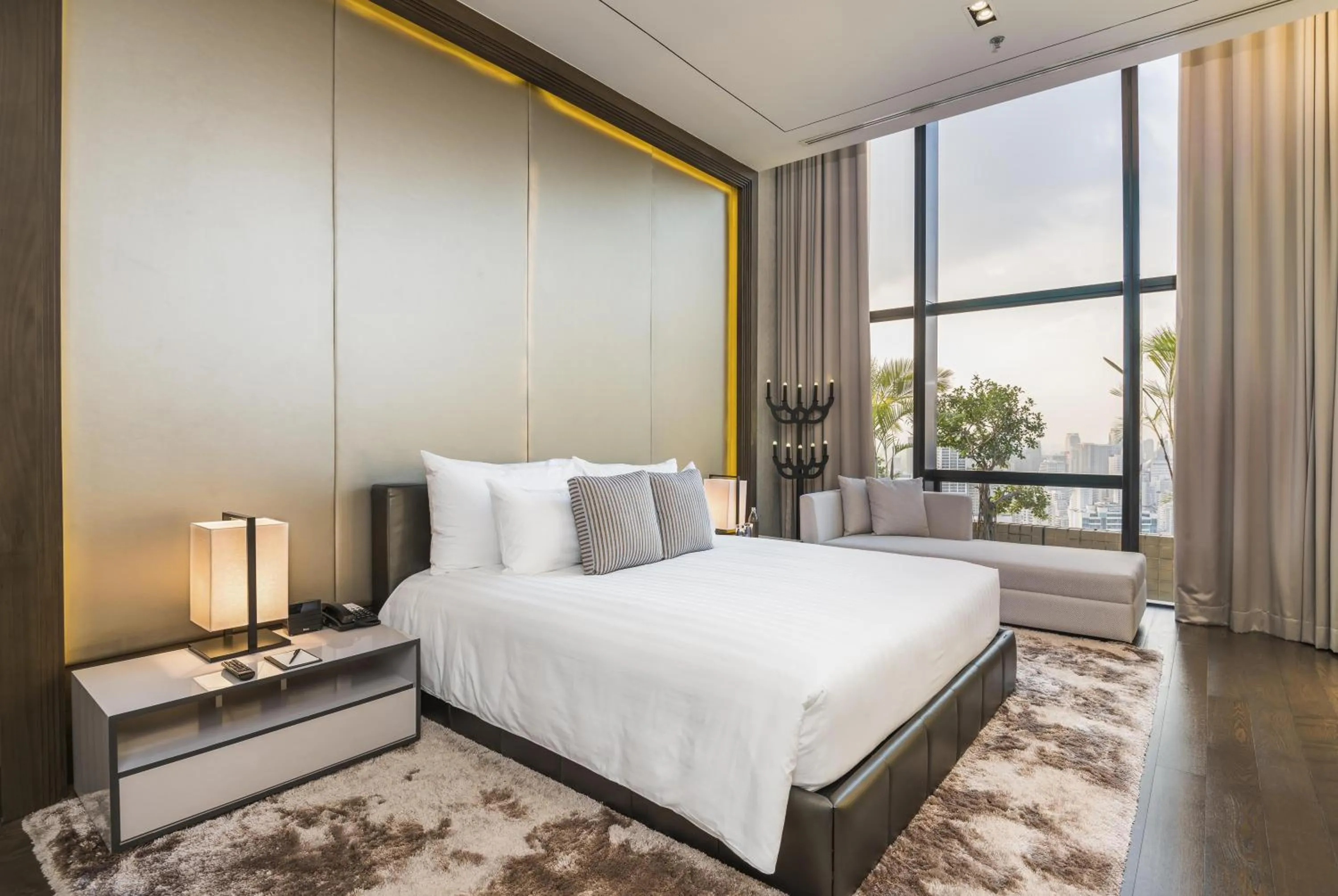 Bed in Emporium Suites by Chatrium