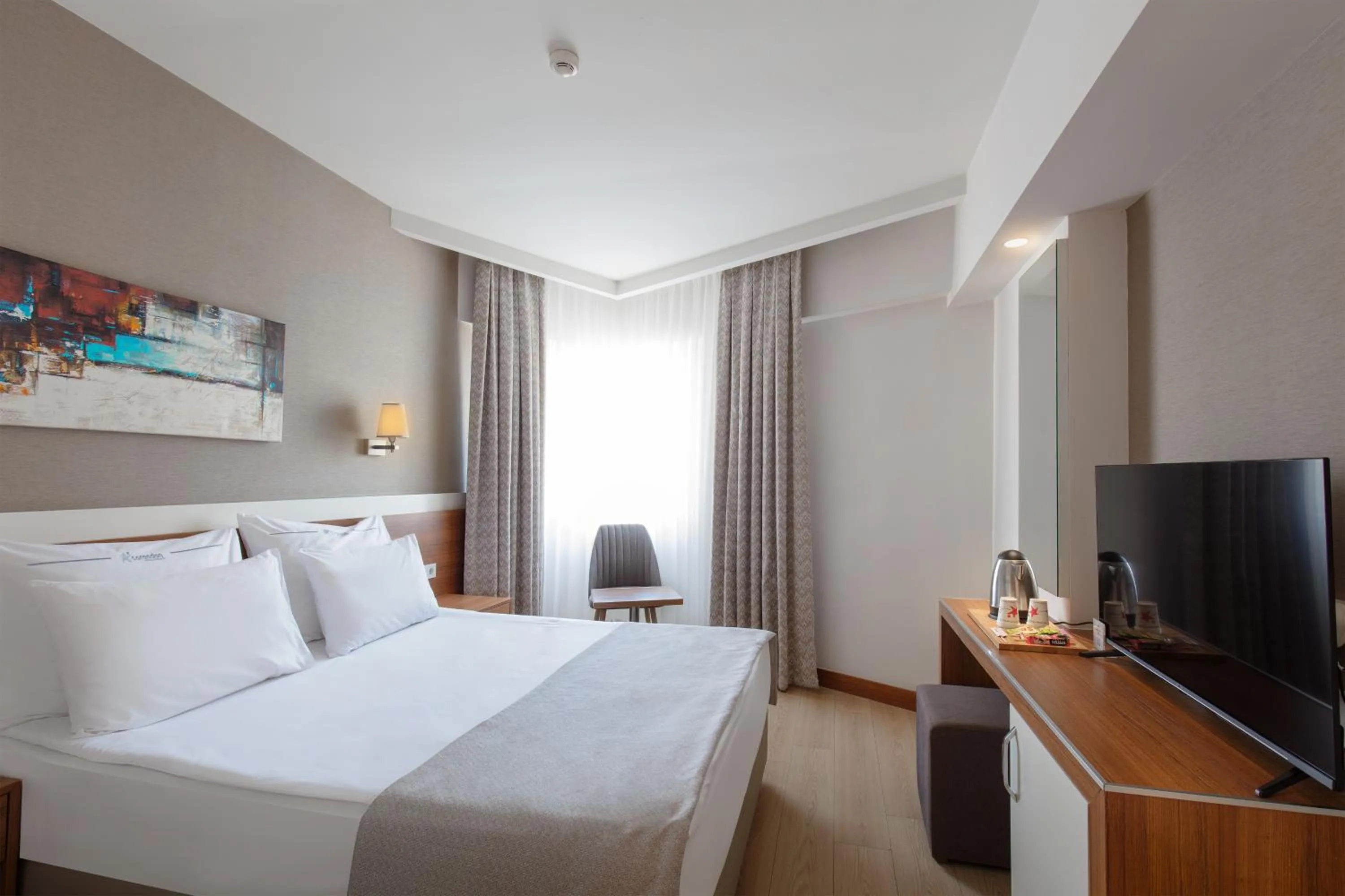 Bed in Grand Park Lara Hotel