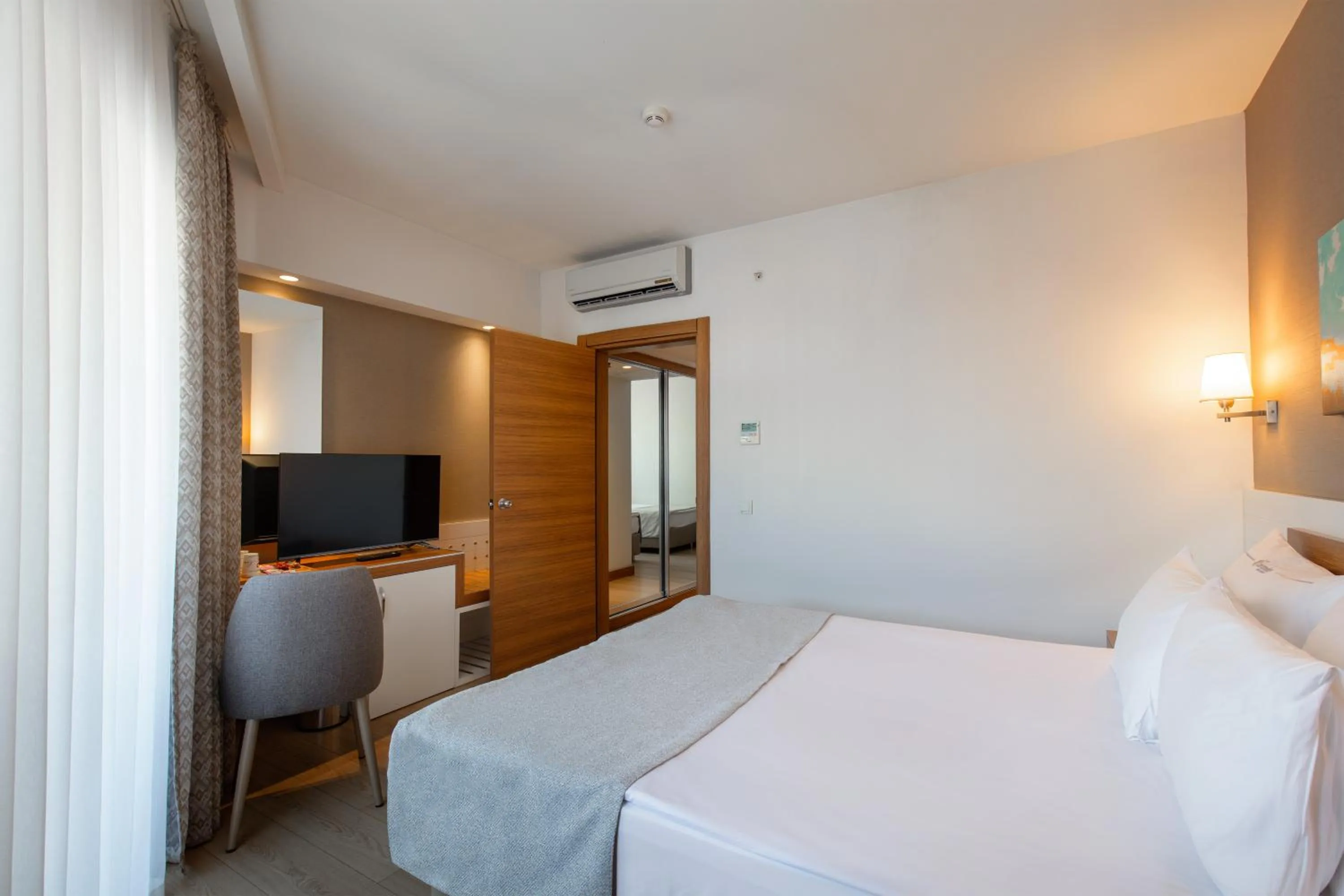 Bed in Grand Park Lara Hotel