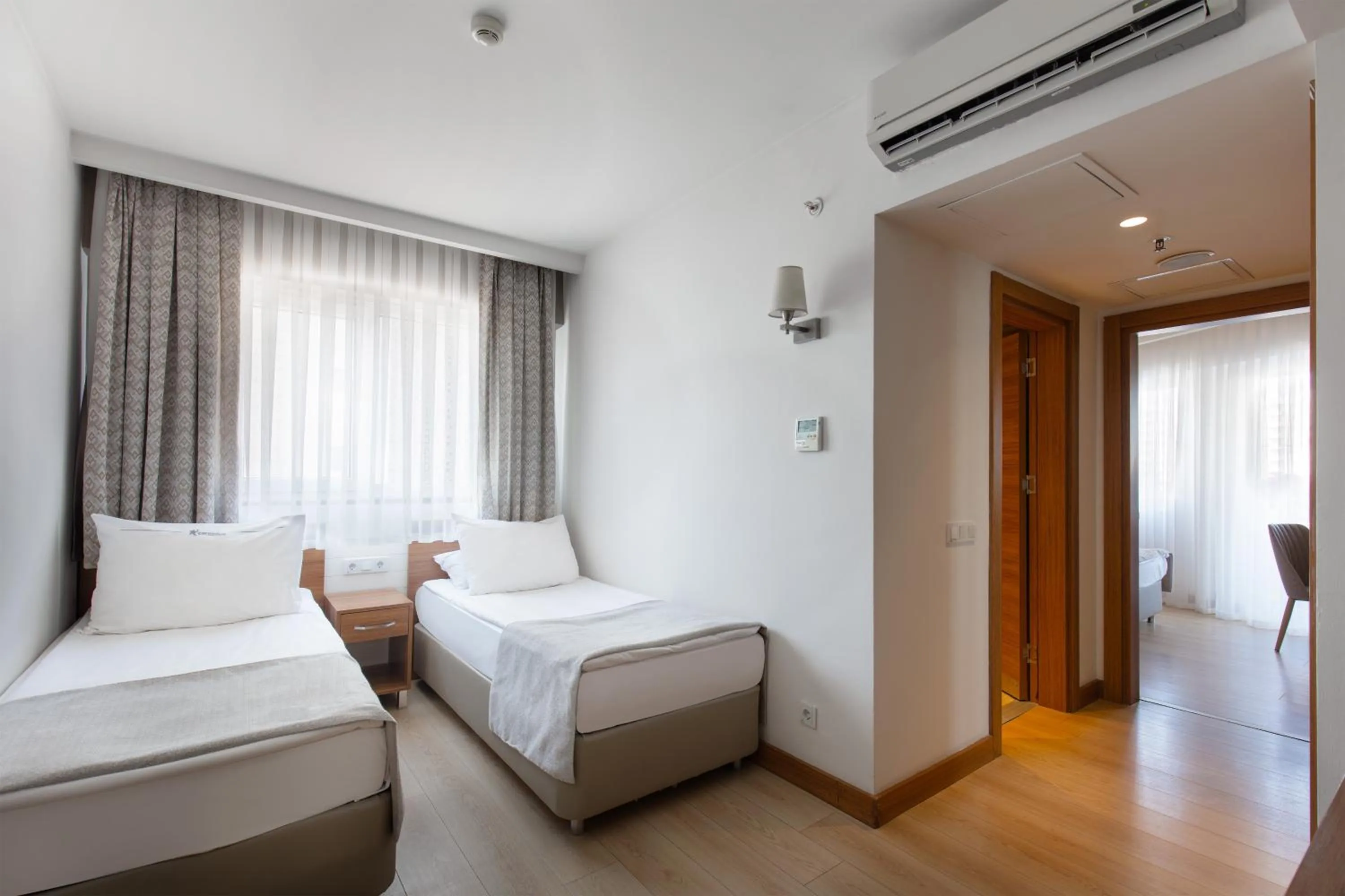 Bed in Grand Park Lara Hotel