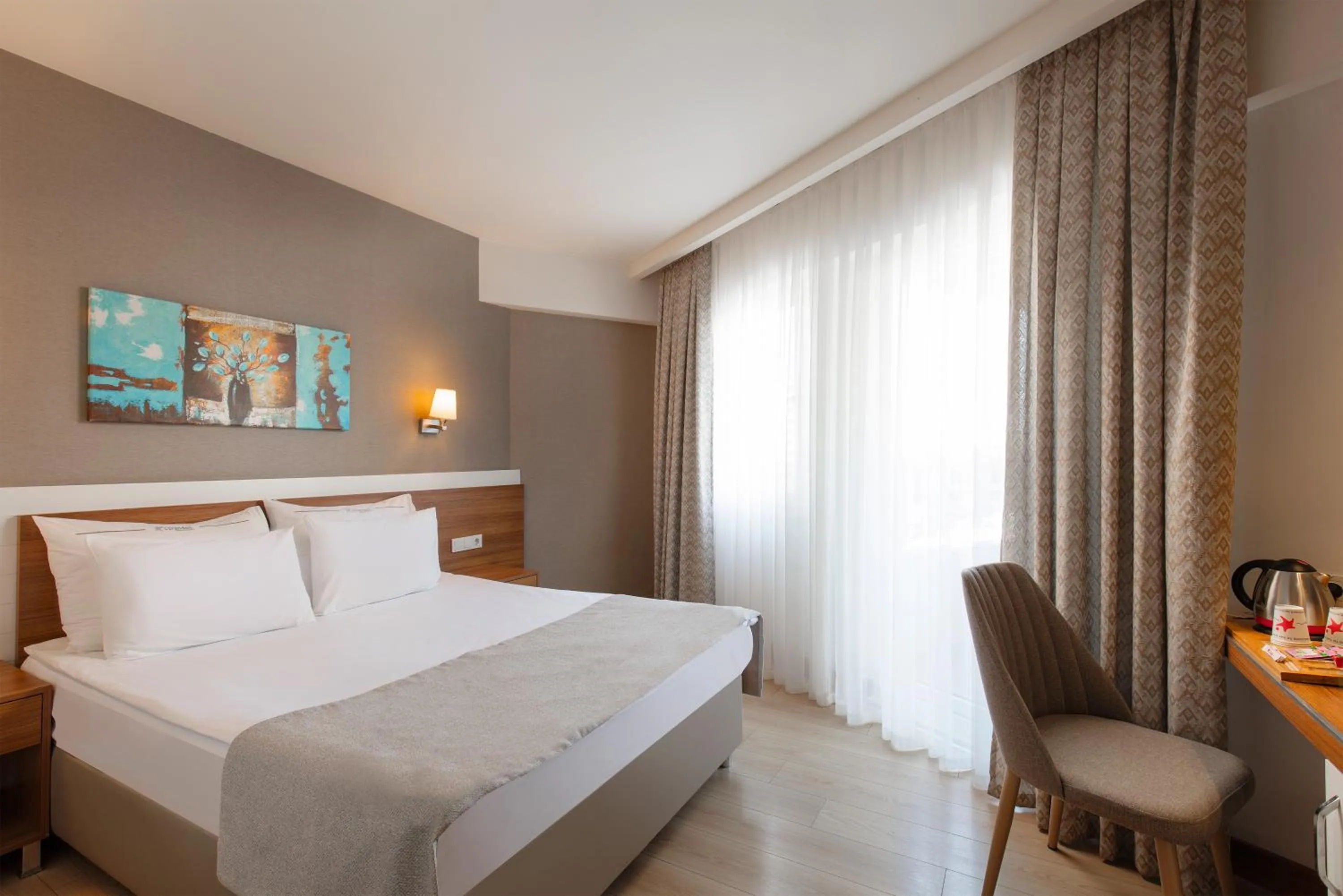 Bed in Grand Park Lara Hotel