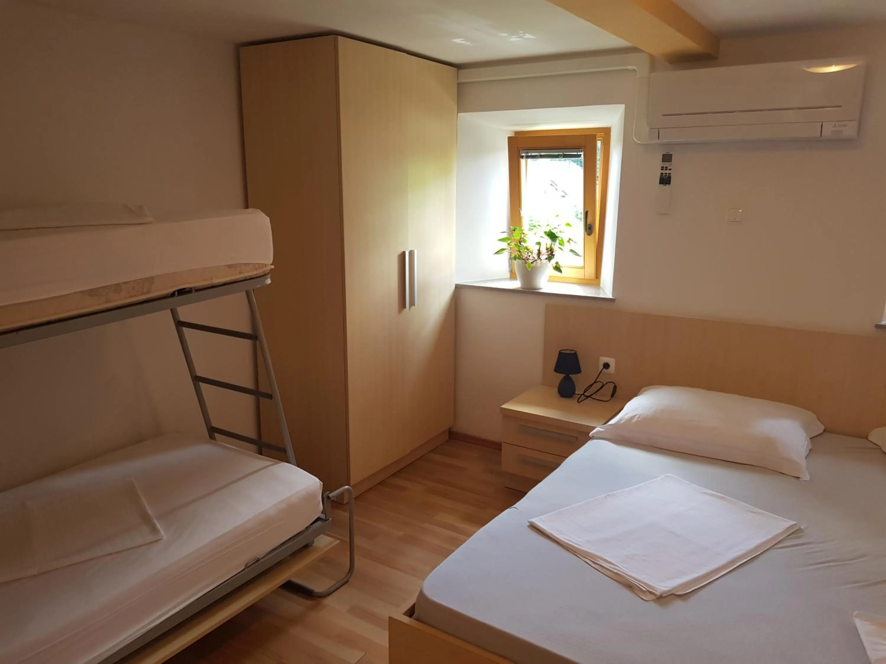 Bed in Domačija Vodnik & Apartments