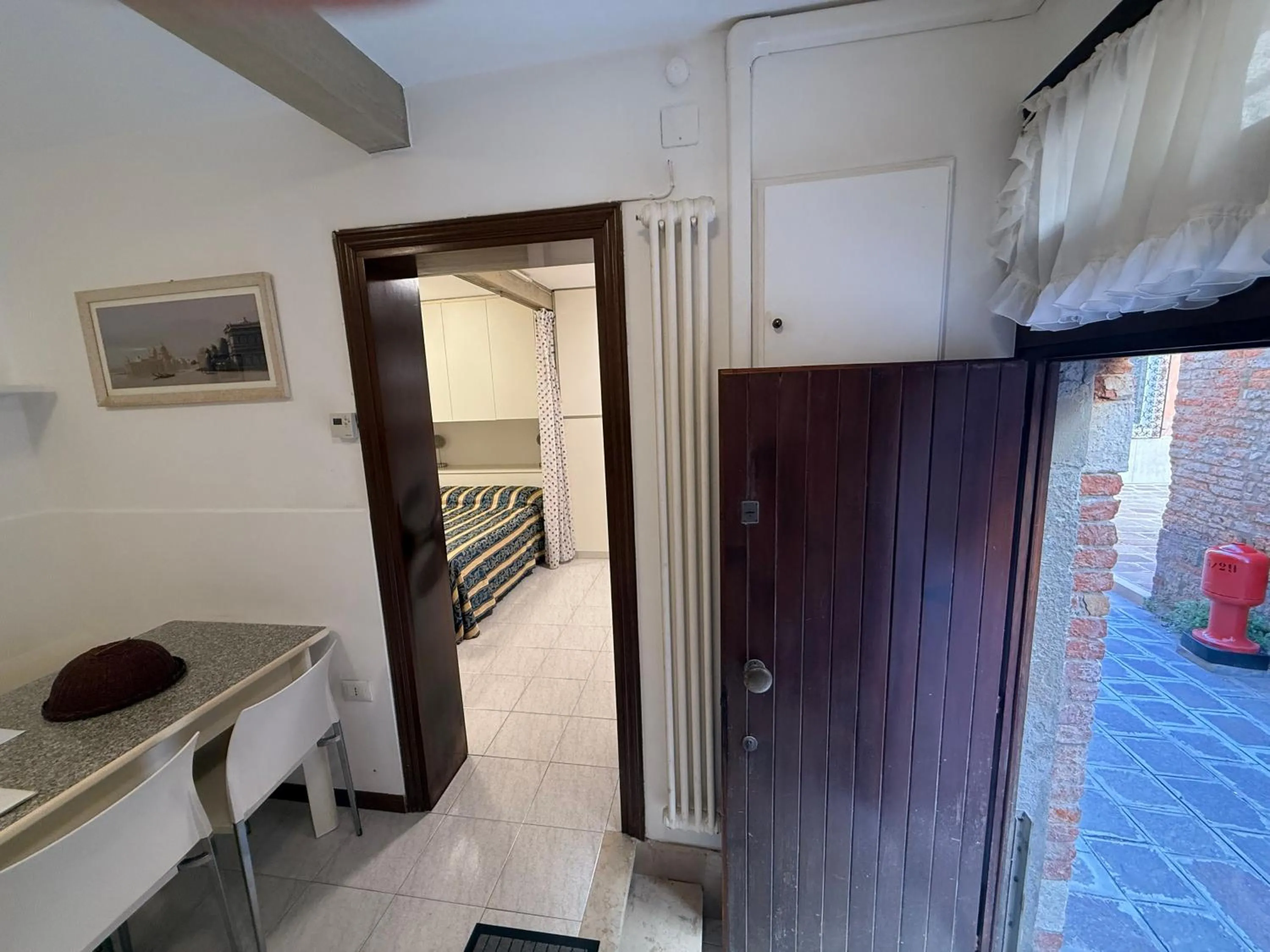 kitchen, Bed in Appartamento Carboncina