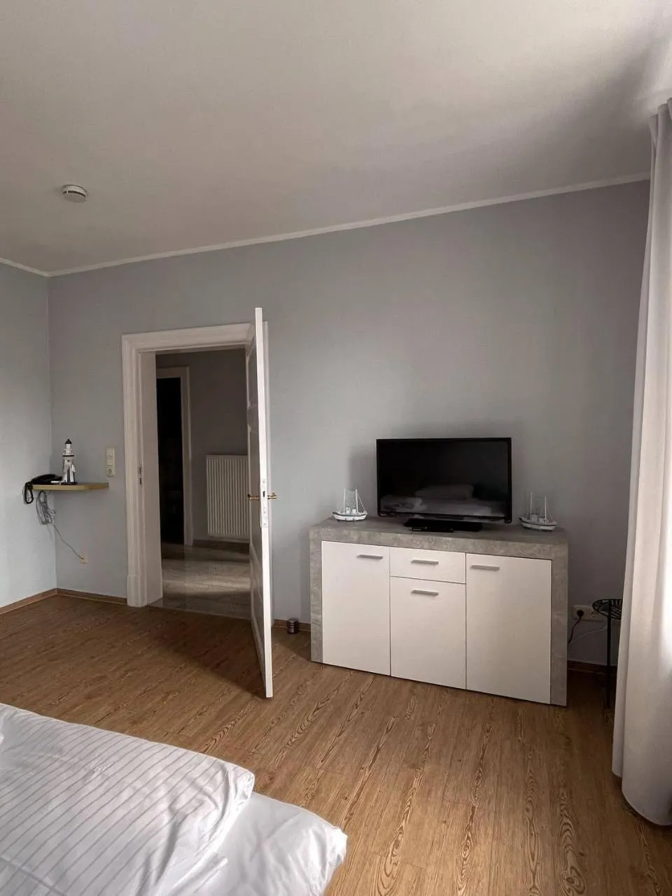 Communal lounge/ TV room, Bed in Villa Seebach