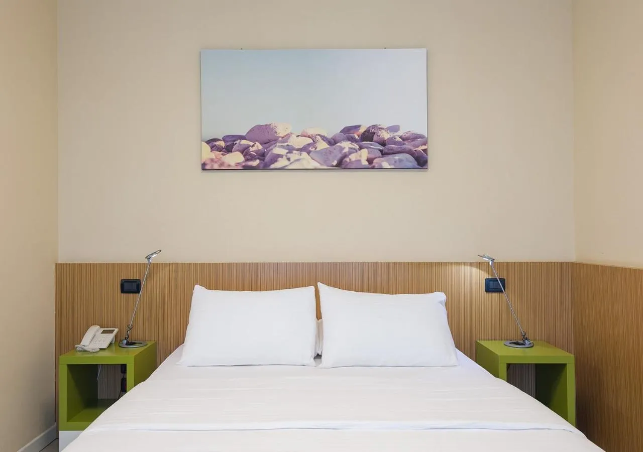 Communal lounge/ TV room, Bed in Camplus Turro Casa per Ferie