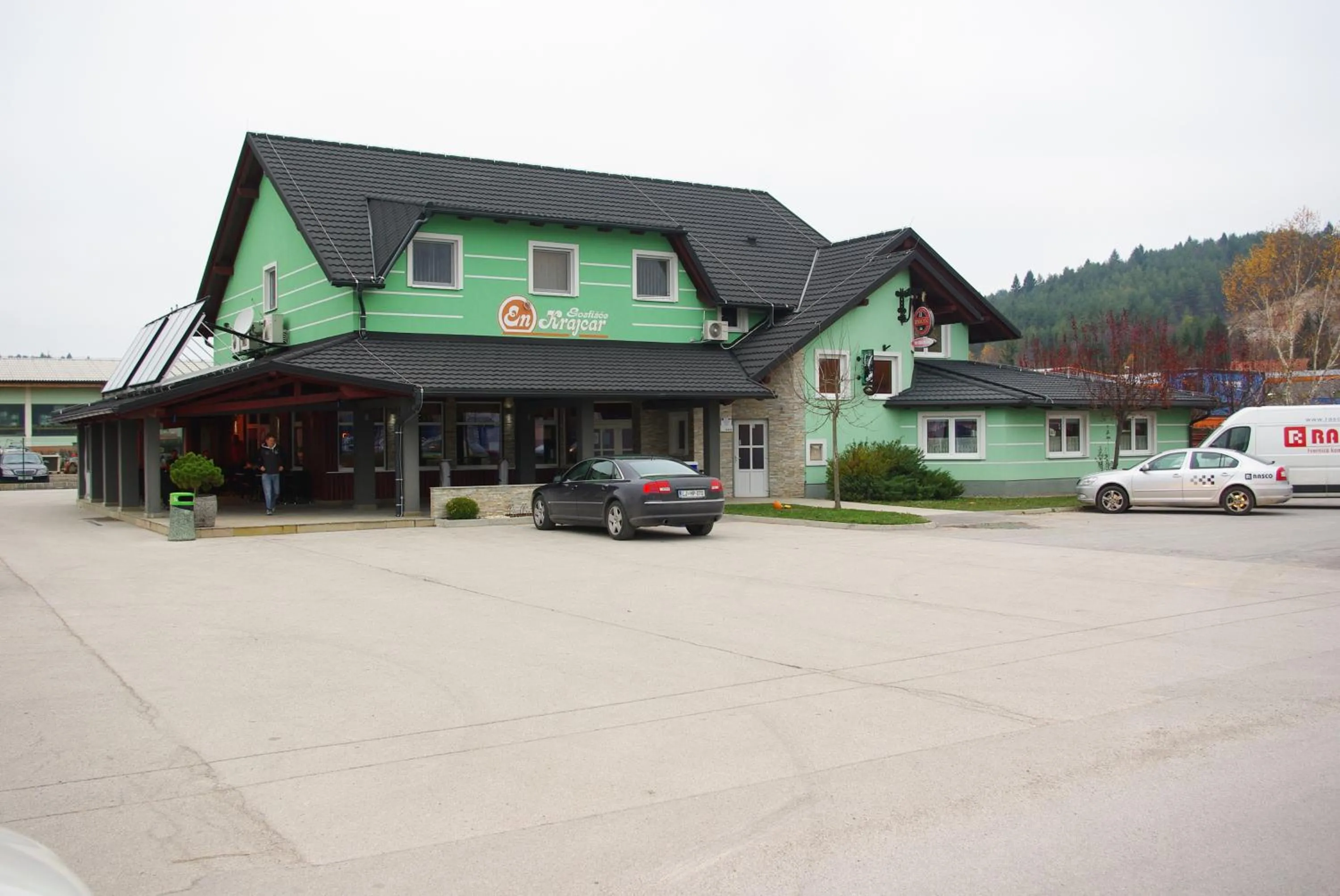 Property building in Rooms En Krajcar